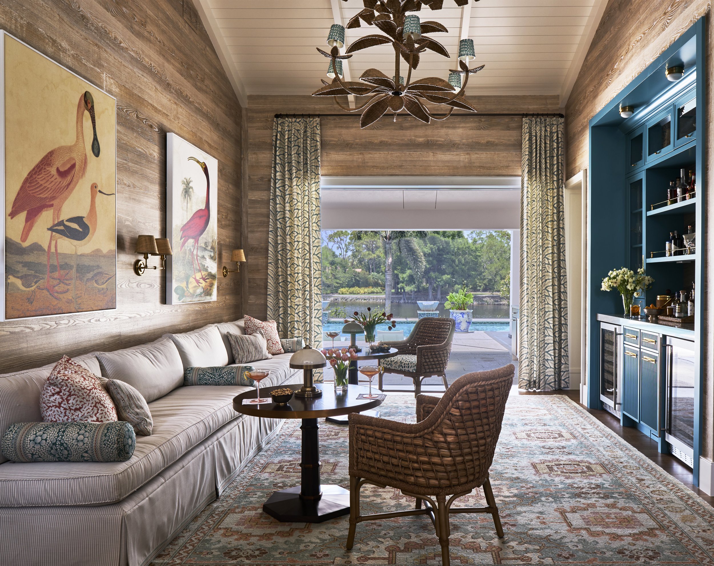 Luxury waterfront home in Bonita Springs, Florida, designed by North Shore Nest with layered coastal textures, colorful tones, and indoor-outdoor living.