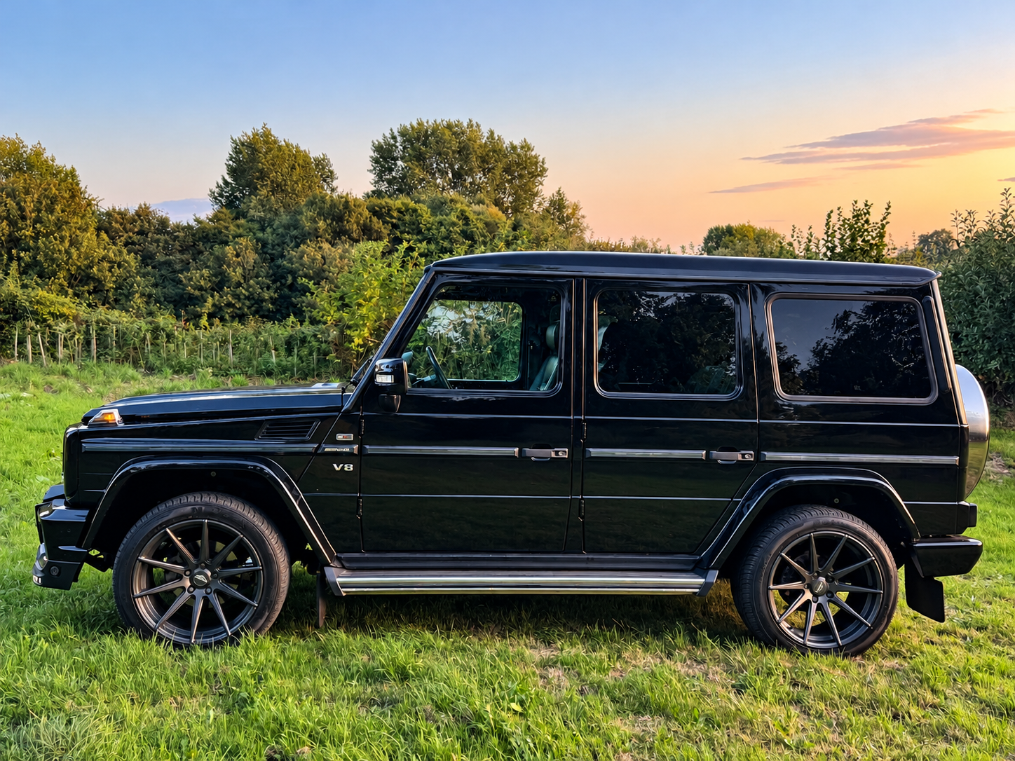 0005 Black Luxury SUV at Golden Hour.png