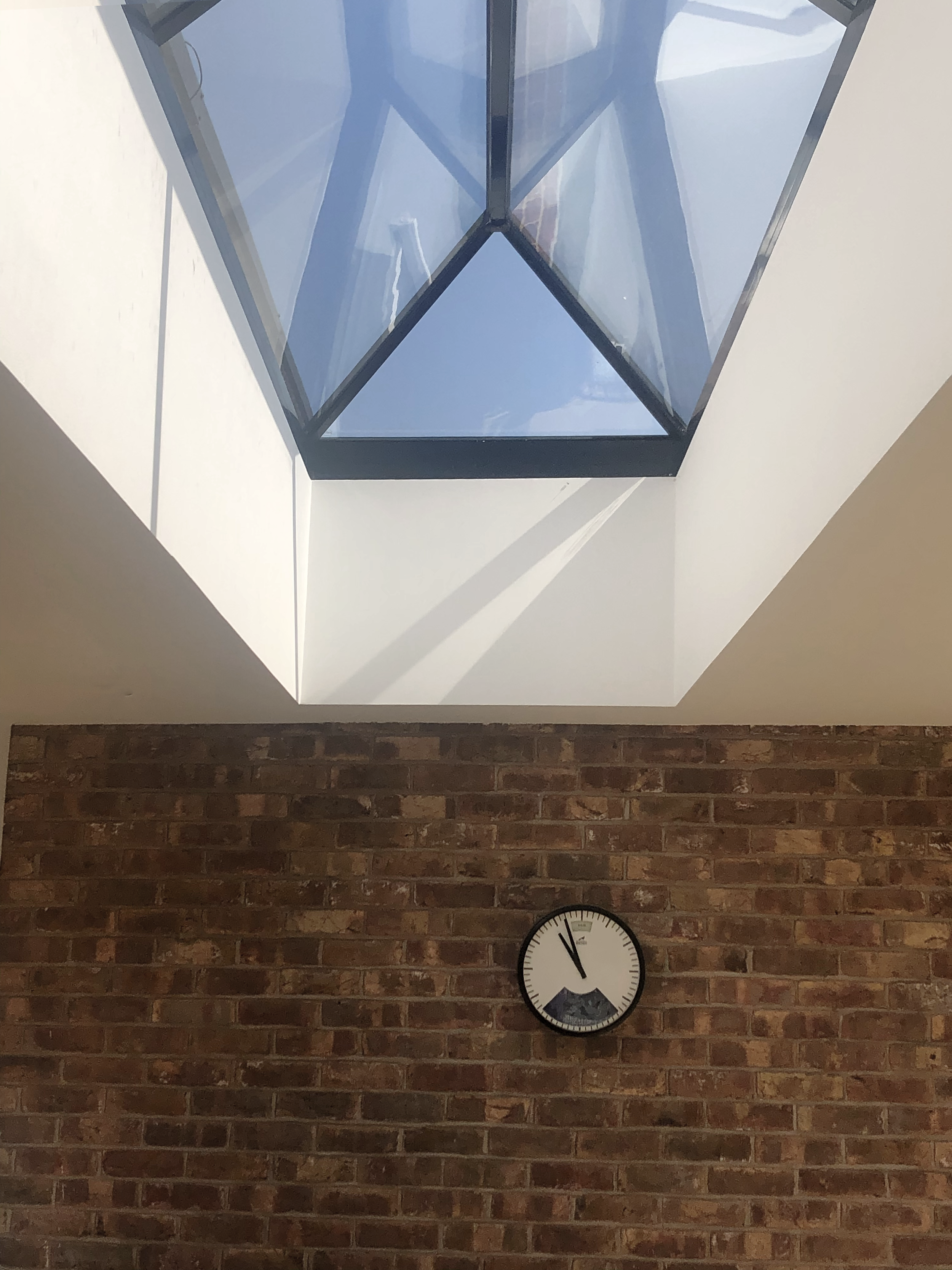 glazed canopy - feature brick wall