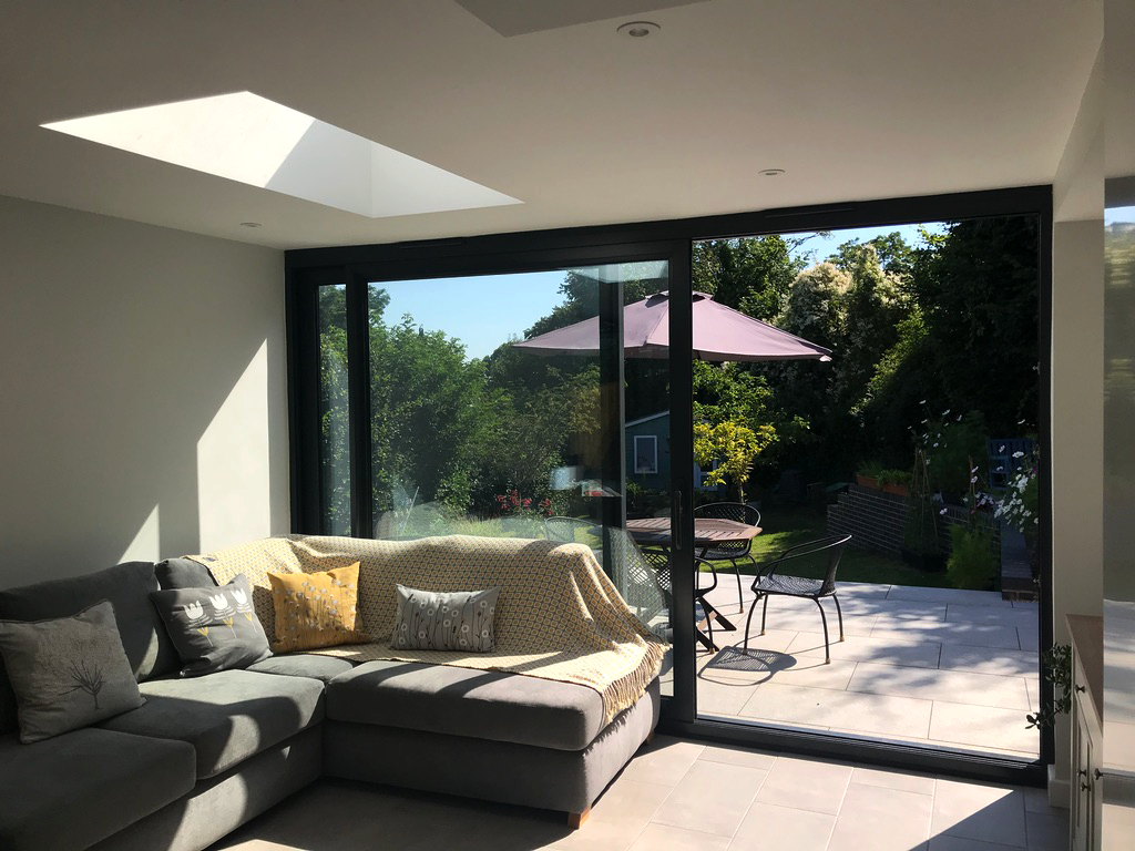 Interior Snug living area - large glazed doors to Croucher Croft