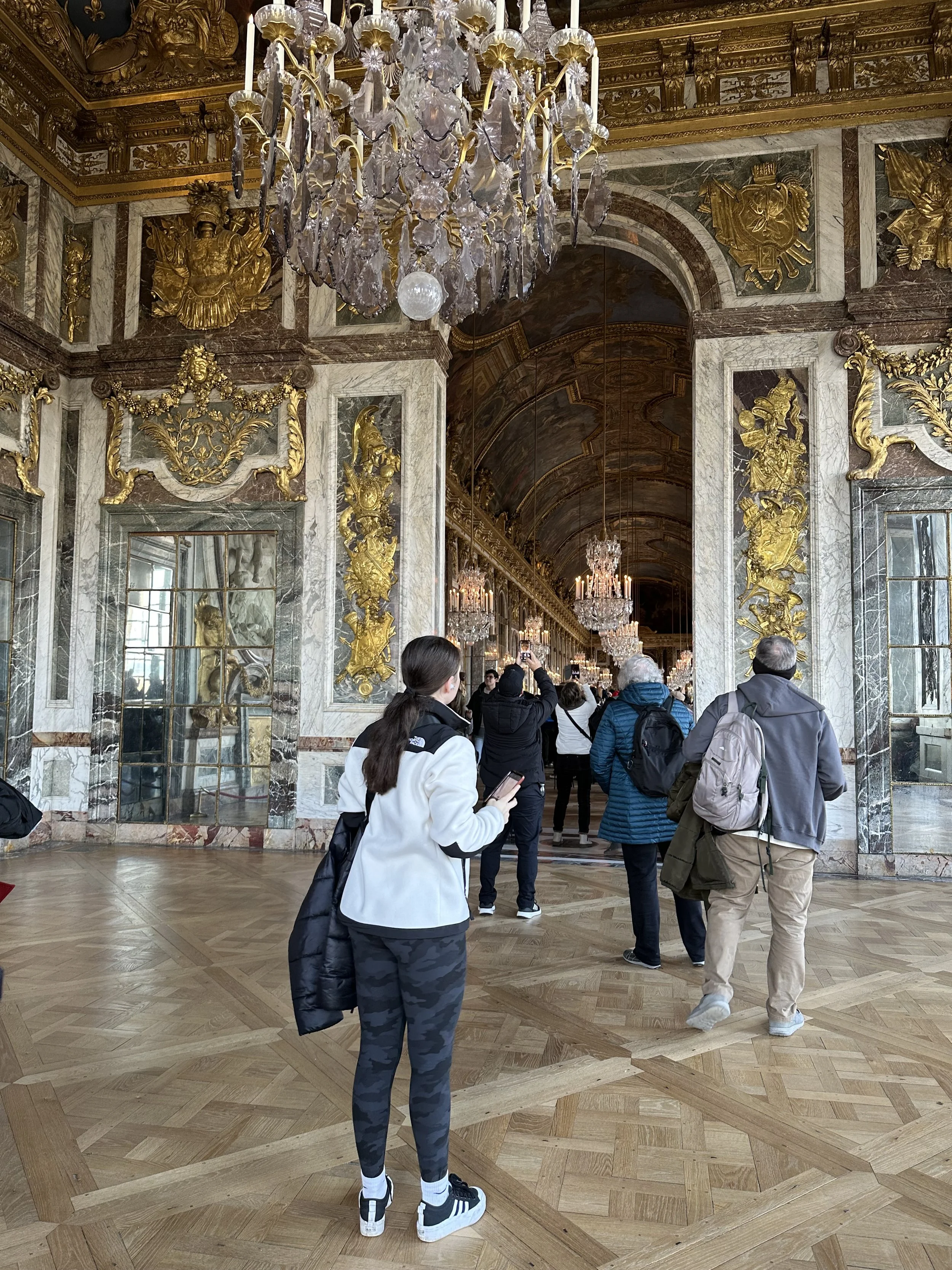 American teenager girl visiting Versailles