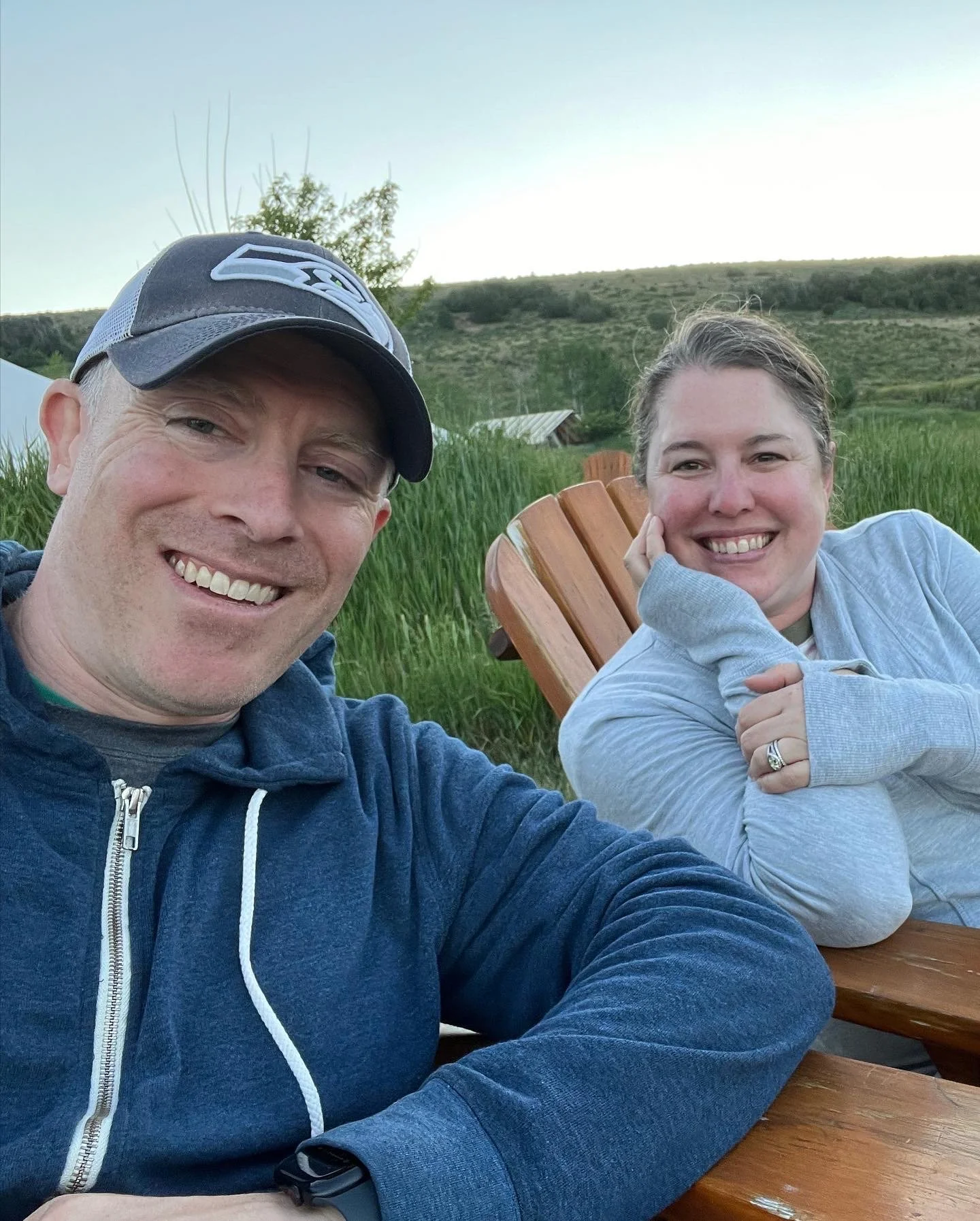 Parents relaxing by the fire