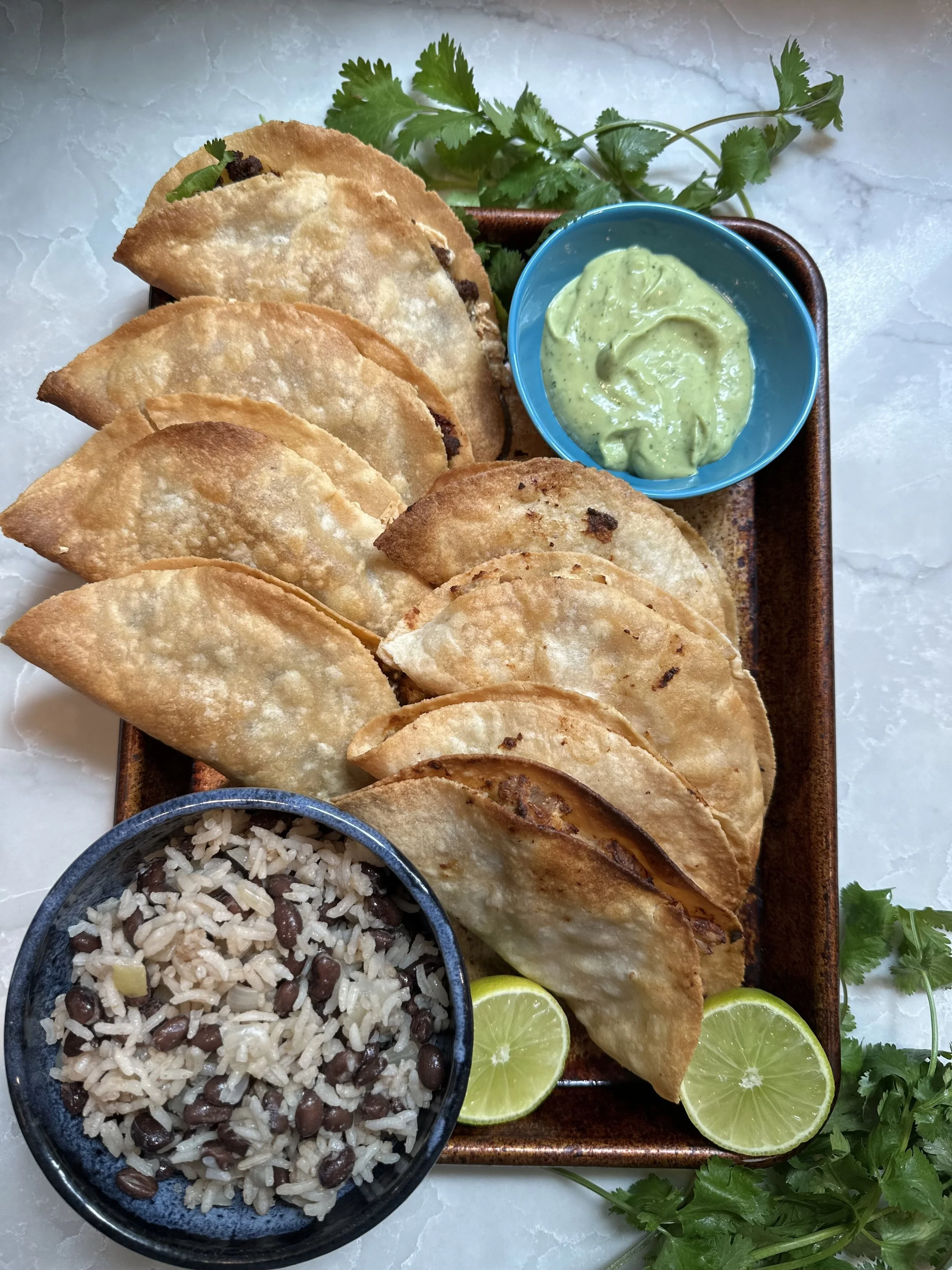 Crispy tacos with rice & black beans