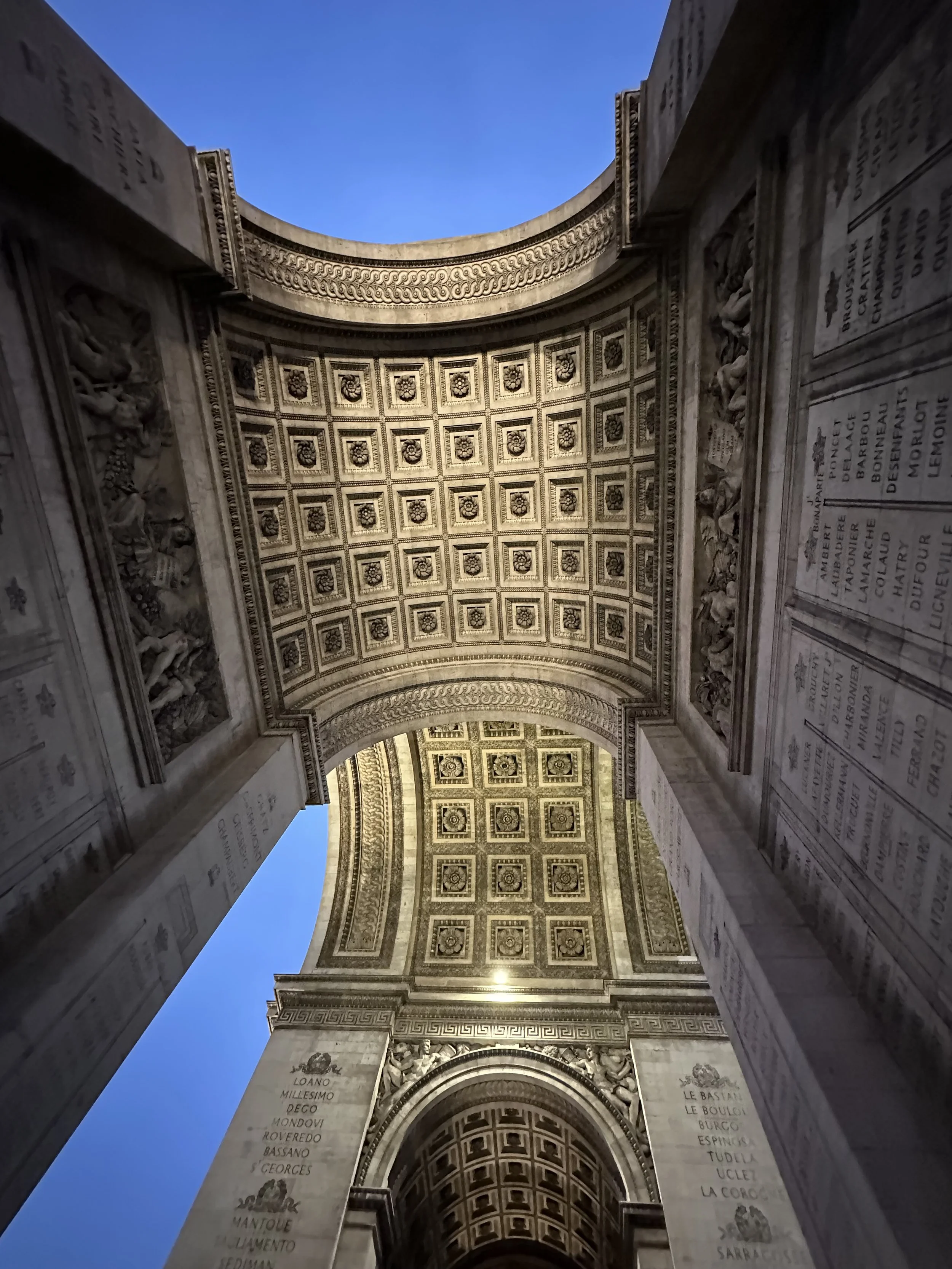 Looking up into the Arc di Triomphe from underneath.