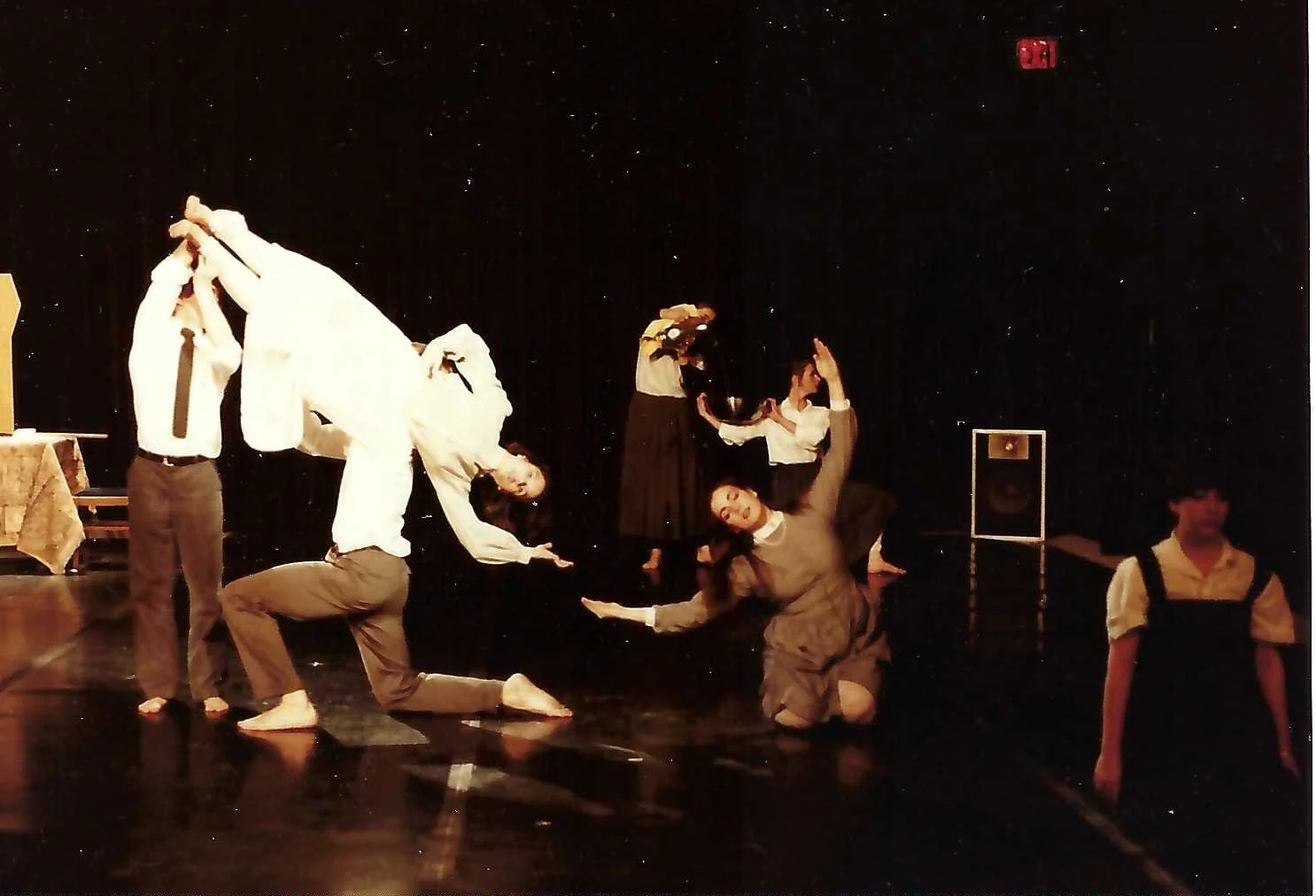 These were rehearsal photos at the University of Rochester, taken by an unknown photographer. Here the lifted dancer becomes a human pitcher, poured into the human bowl formed by the arced arms of the kneeling dancer, while upstage a dancer pours a pitcher of water into a real bowl.