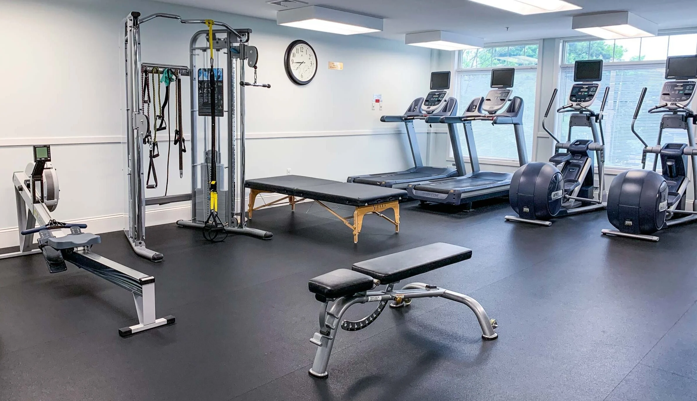 Private fitness studio layout with cardio and strength equipment at Body Soul Training in Providence, Rhode Island.