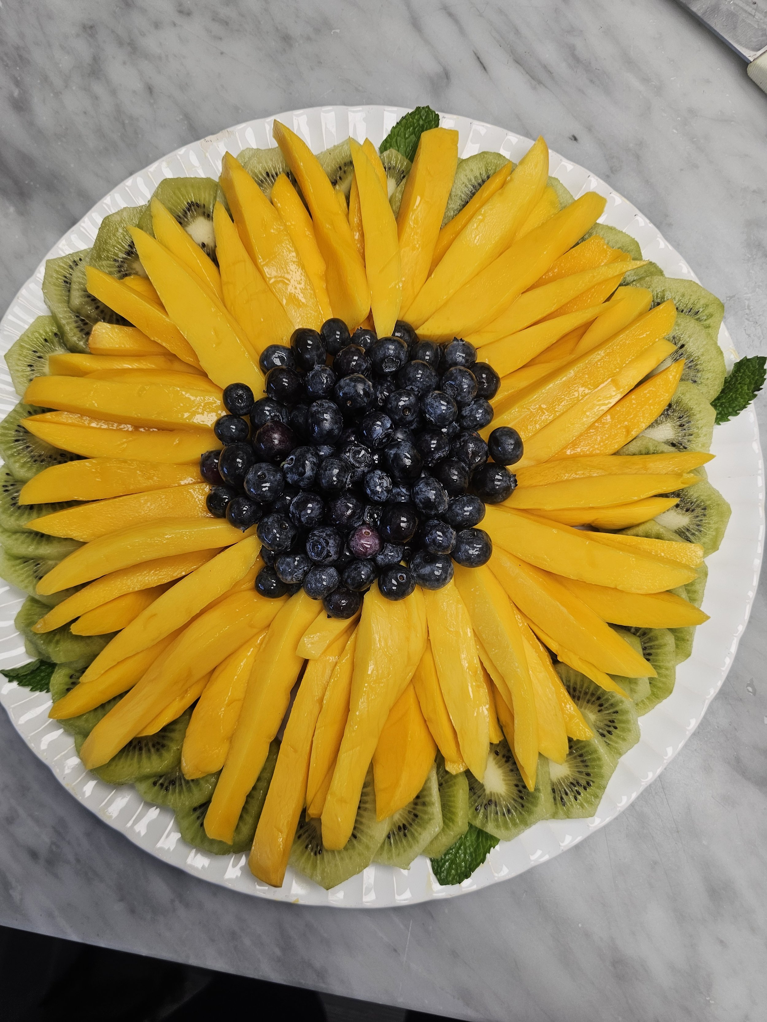 mango, kiwi, blueberry sunflower tray