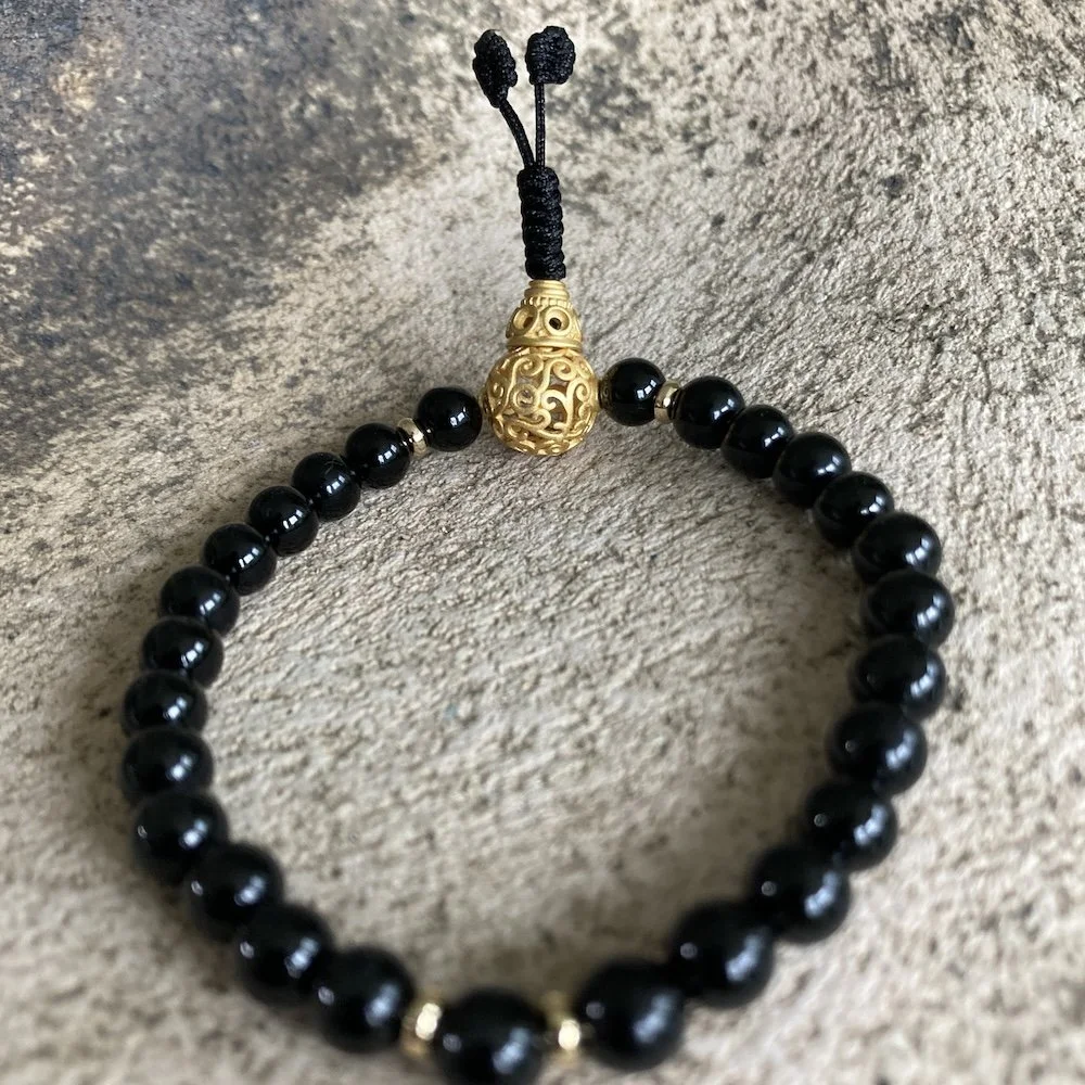 05. Black onyx and gold meditation mala.JPG
