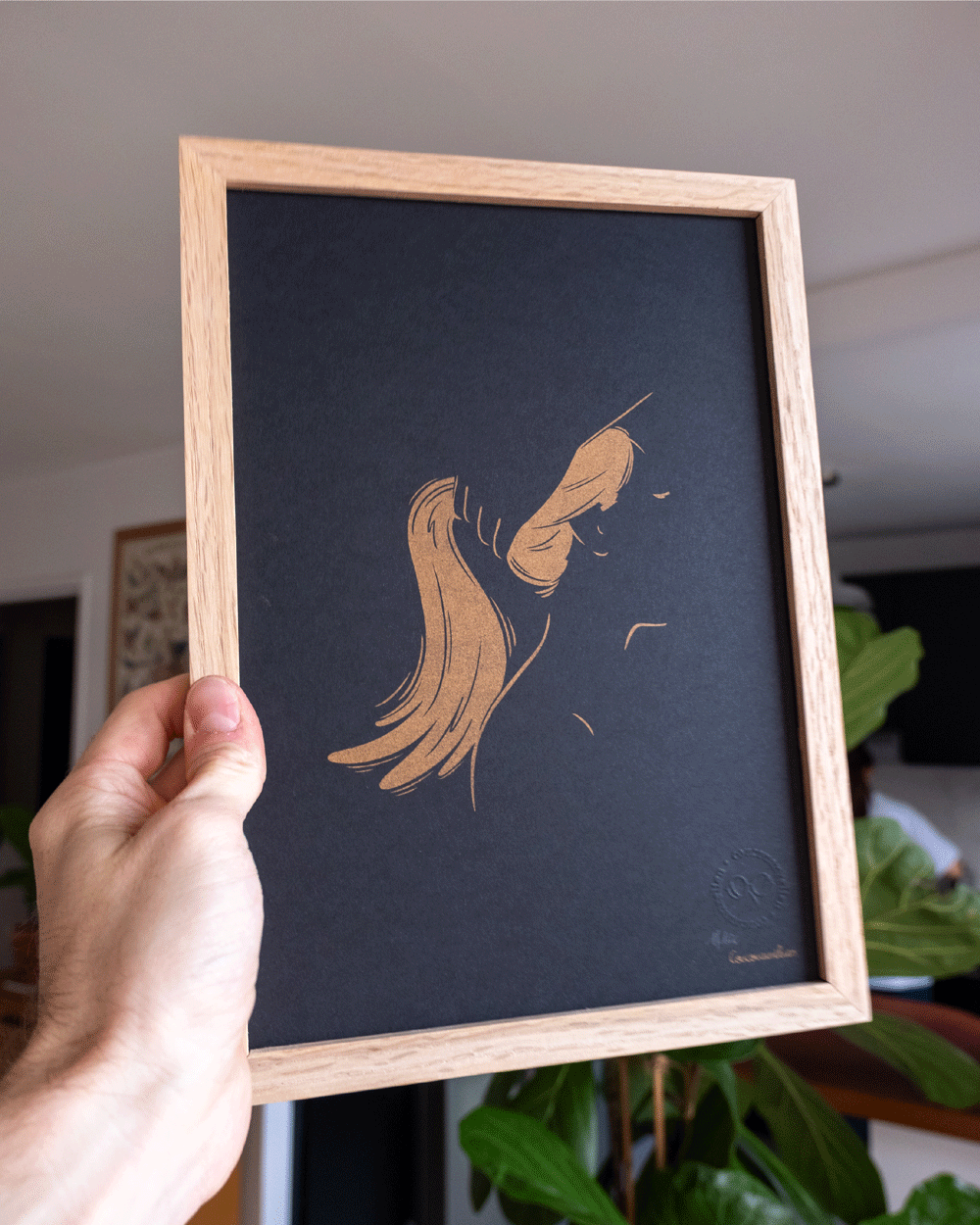 A gold risograph illustration evocatively depicting fellatio, suggested by a ponytail and a few facial features. The title "ponytail" plays on the double meaning. Author: coucouaurelien