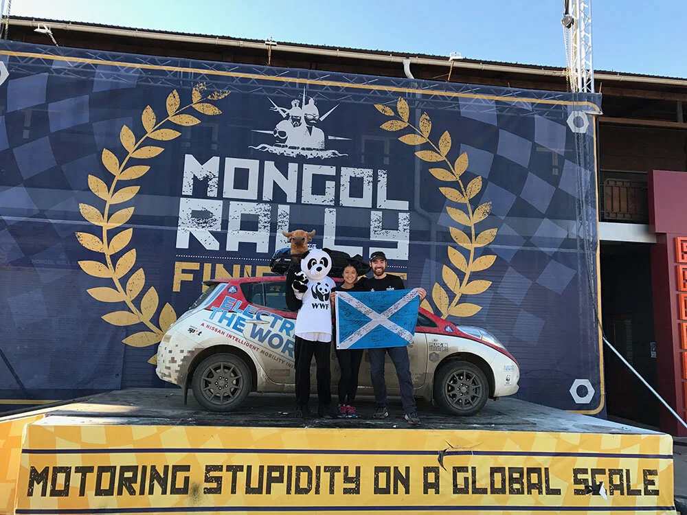 Chris and Julie celebrate at the finish line