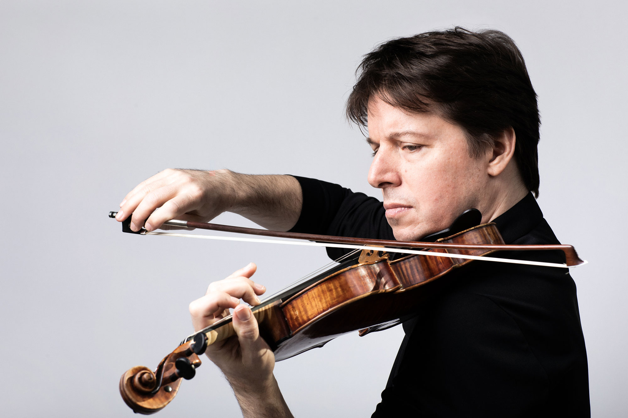 A Professional playing a Contemporary Violin