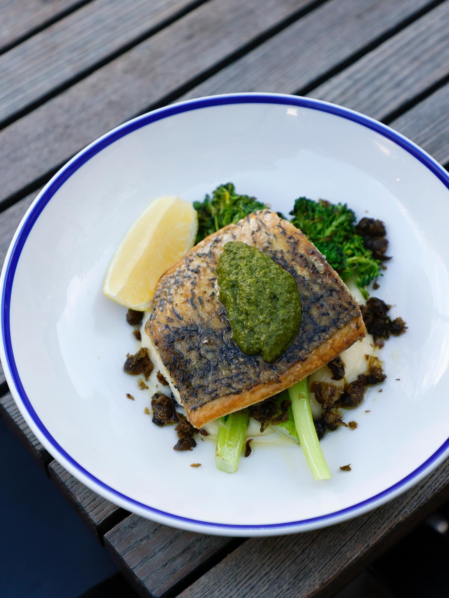 Pan seared barramundi, broccolini, mash, salsa verde. 
Been an absolute hit on these sunny days ☀️🐟