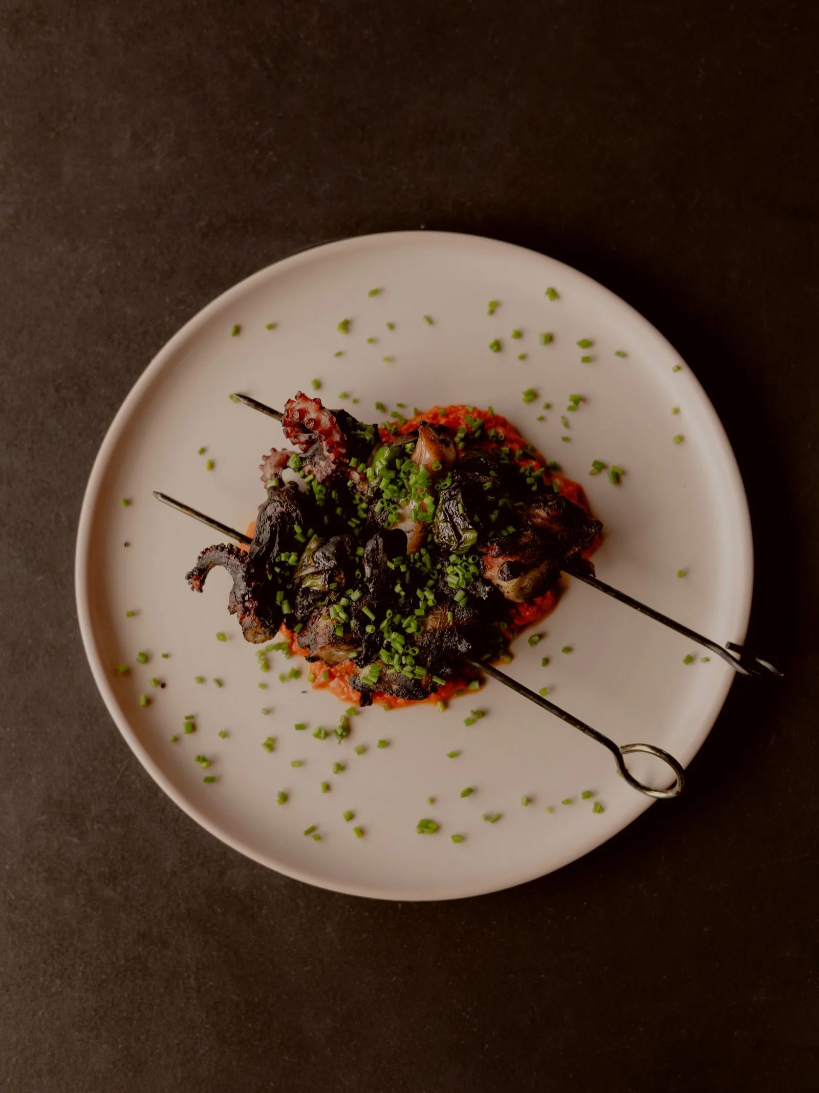 our W.A. octopus - familiarly known as &lsquo;occy skewers&rsquo;.
Served with shishito peppers &amp; ajvar.