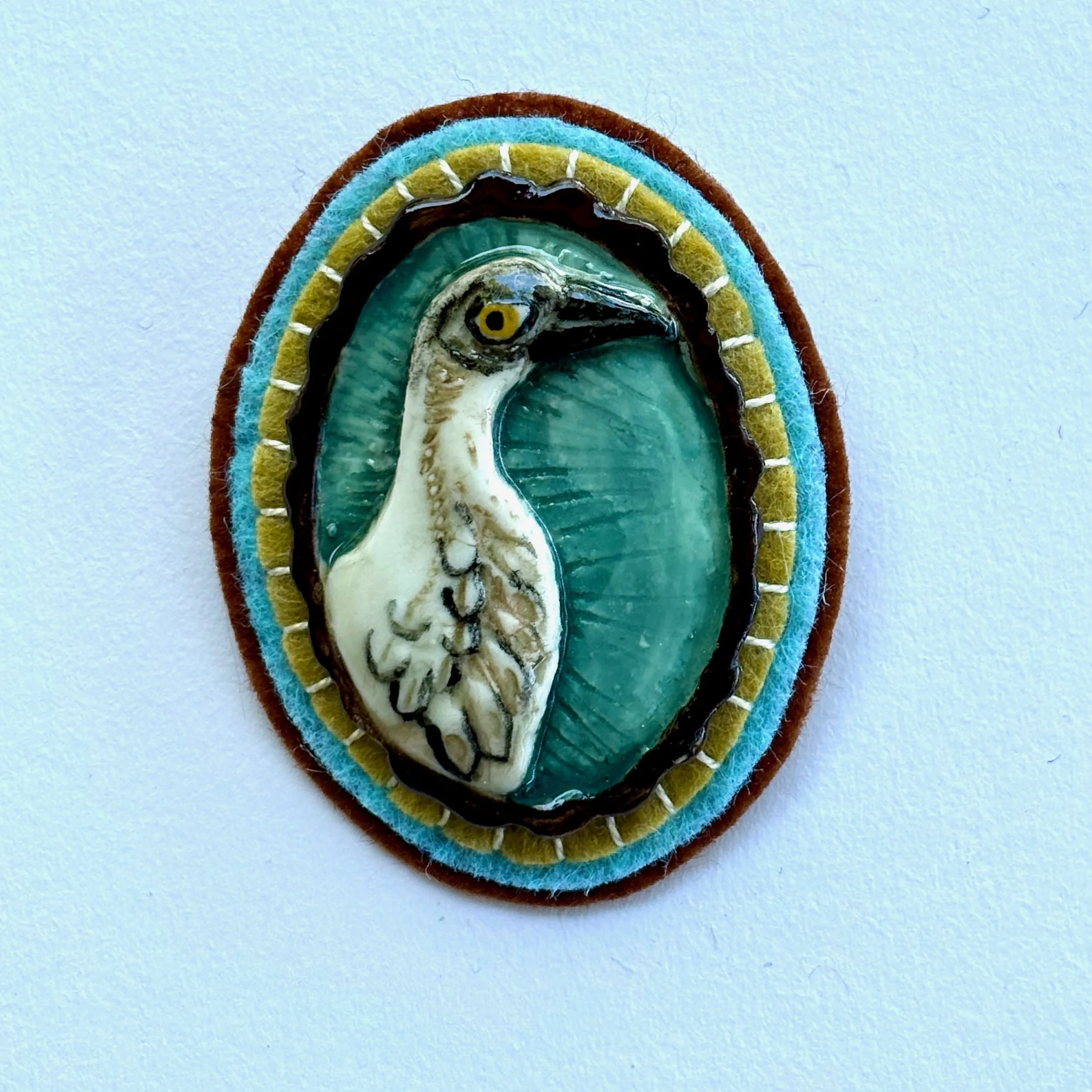 curlew on turquoise and dard brown.jpeg