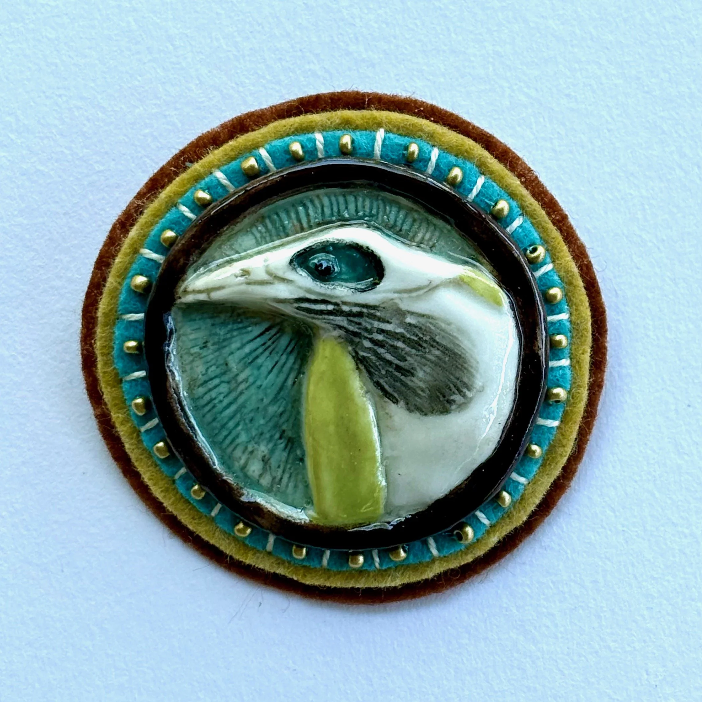 blue faced honey eater with beads.jpeg