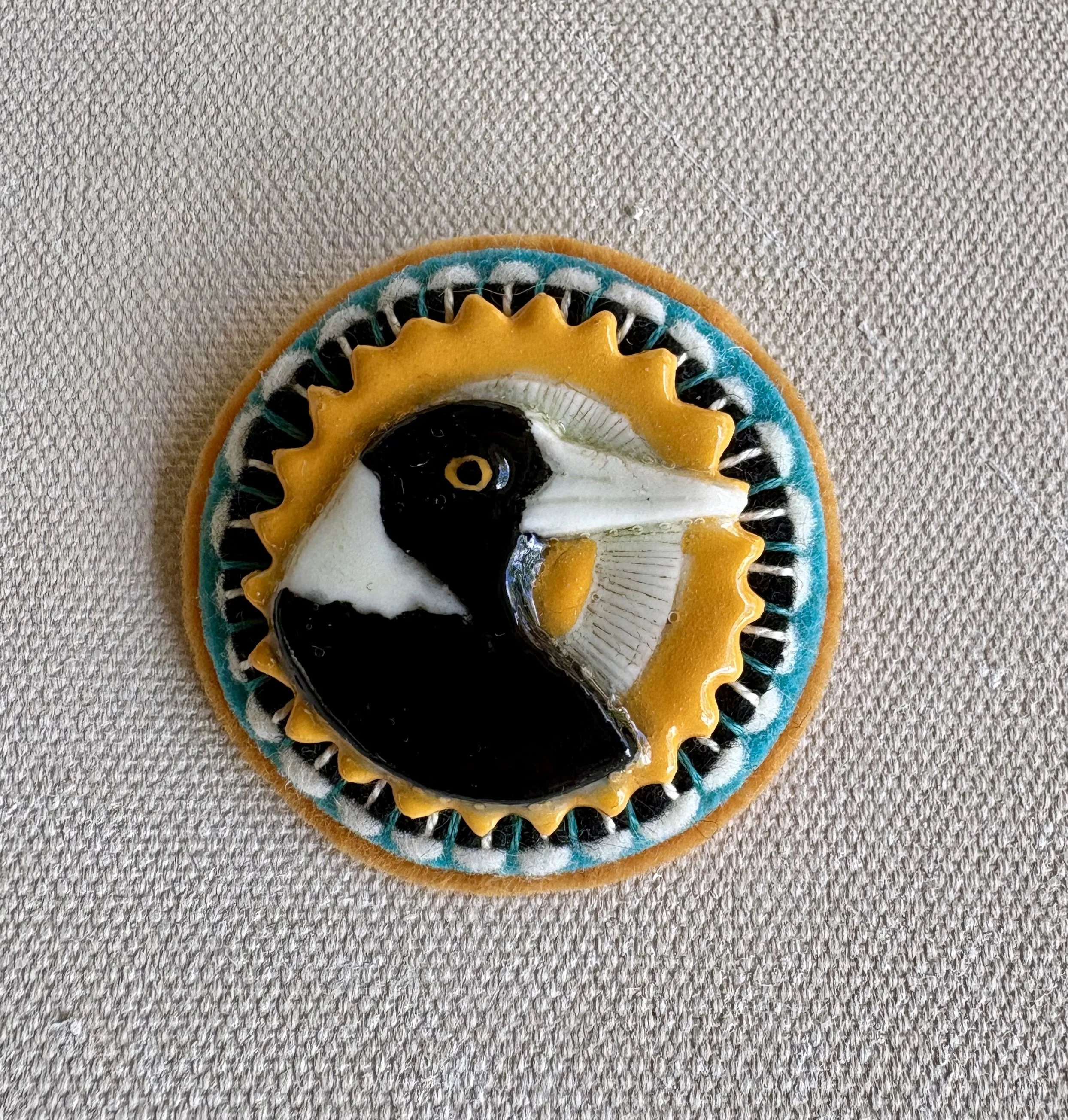 Turquoise and yellow magpie