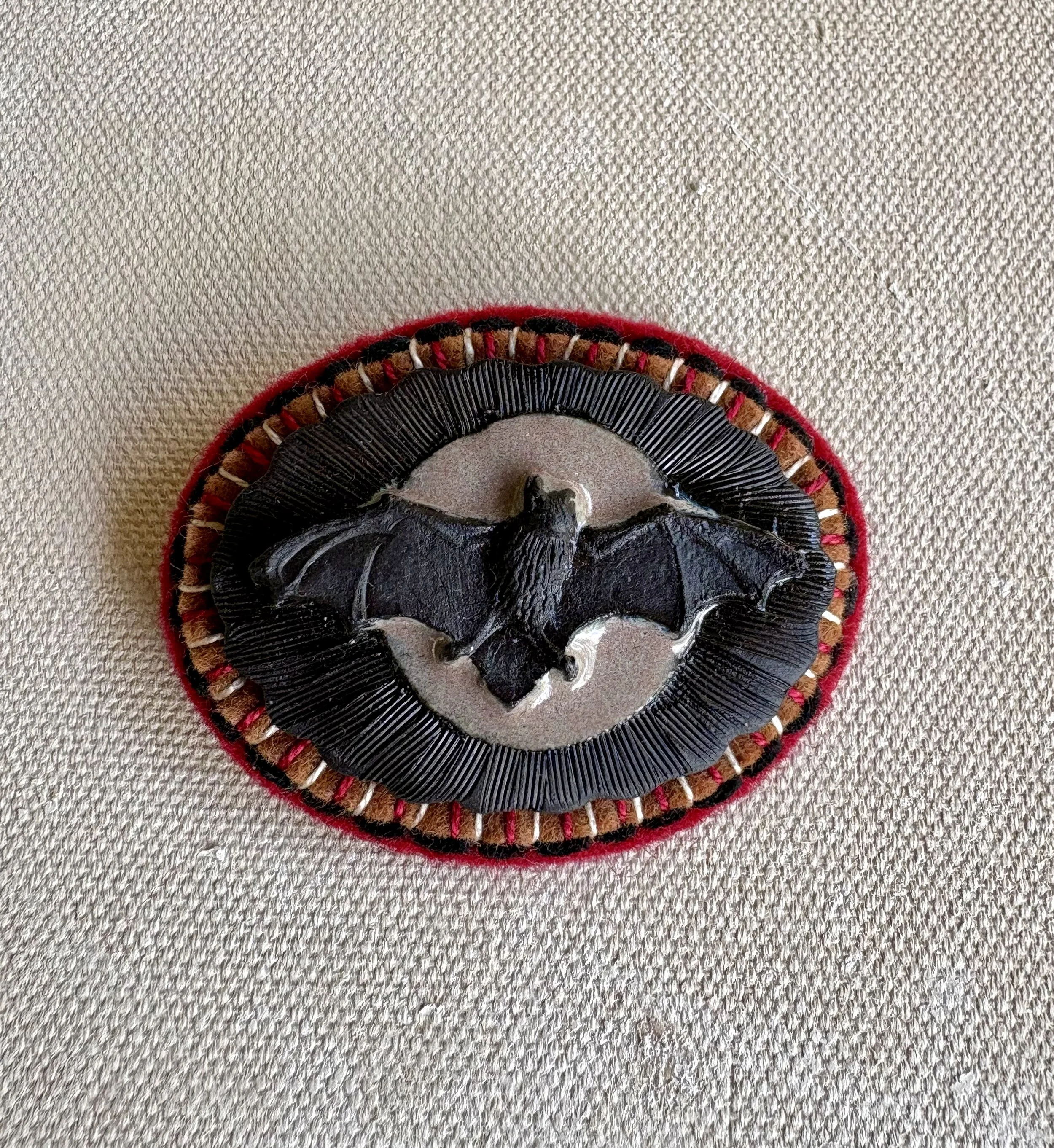 Flying fox with moon and red rim