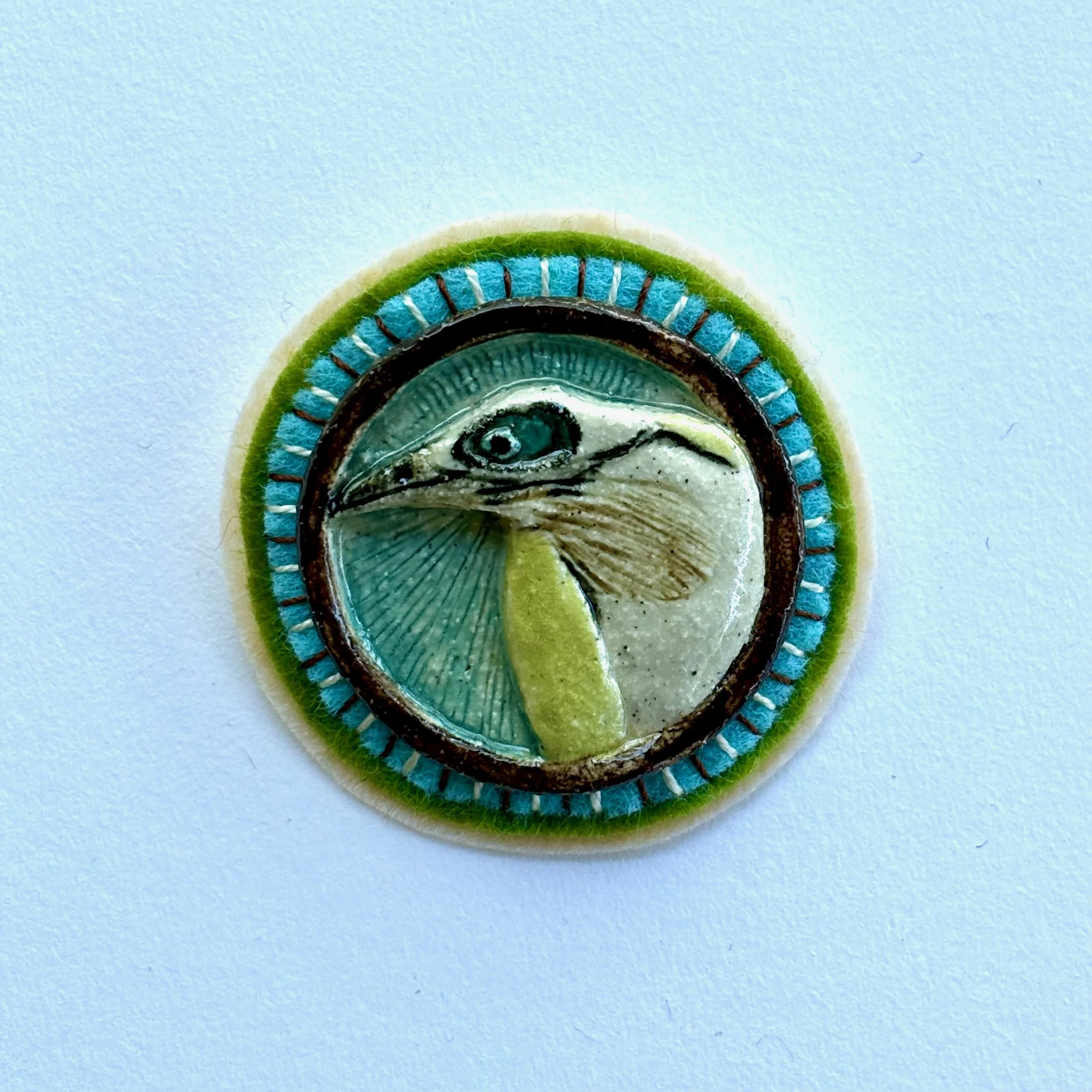 blue faced honey eater on green.jpeg