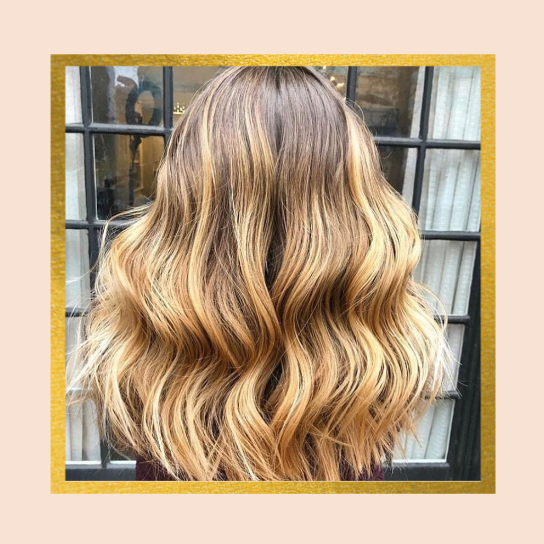 Woman with wavy balayage hair