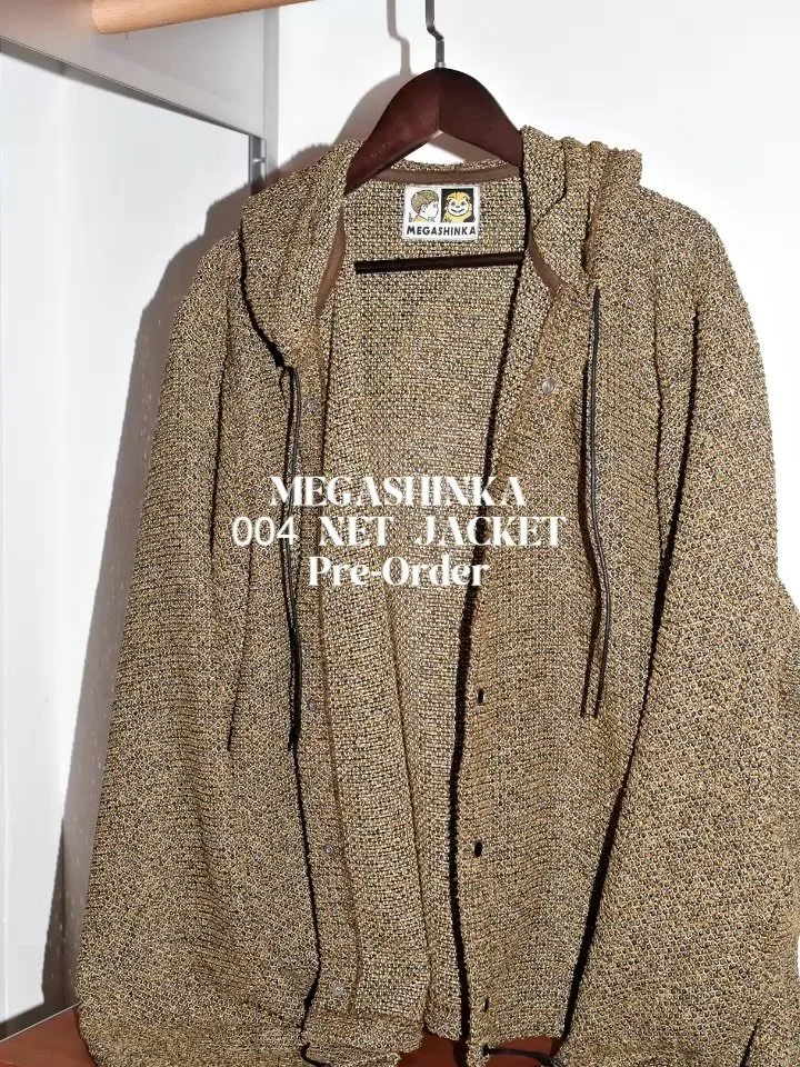 Megashinka Pre-Order

Megashinka 004 Net Jacket (Pre-Order, Drop 31/10/2025) 

004 Net Jacket is inspired by 1970s military anti-insect garments.

We chose a 330g jacquard net fabric which provides a structured, drapey feel.

It features a relaxed, l