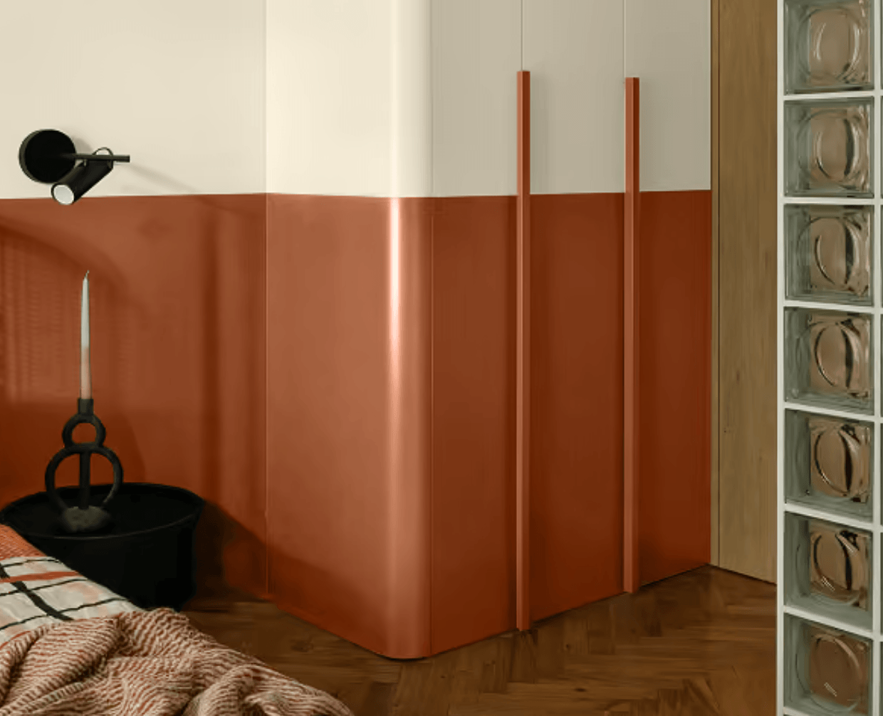 Sico Glazed Earth 6066-84, the 2027 Colour of the Year, featured on warm terracotta bedroom walls and cabinetry with cream accents and glass blocks.
