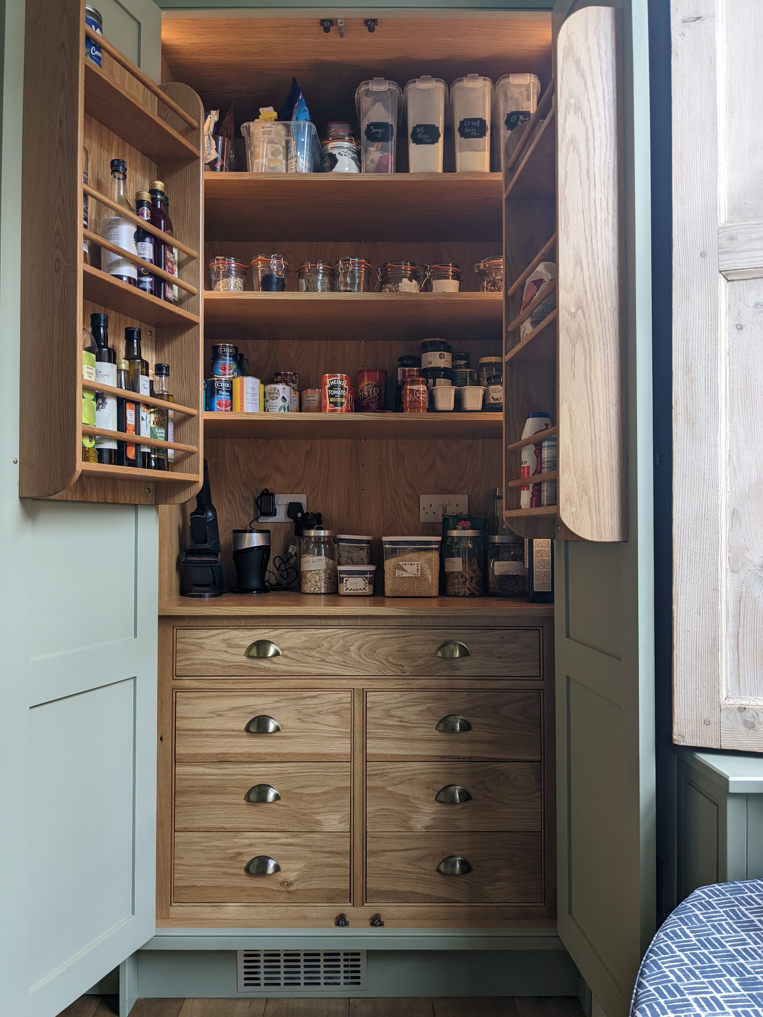 Larder cupboard in kitchen