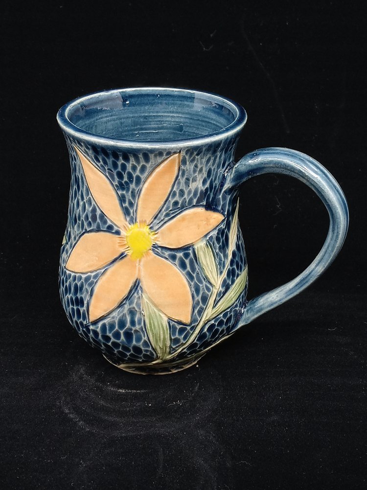 Dark Blue Mug with Orange Flower.jpeg