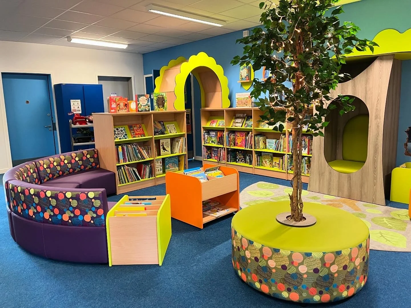 Infant School Library filled with colourful picture and board books to inspire early reading.