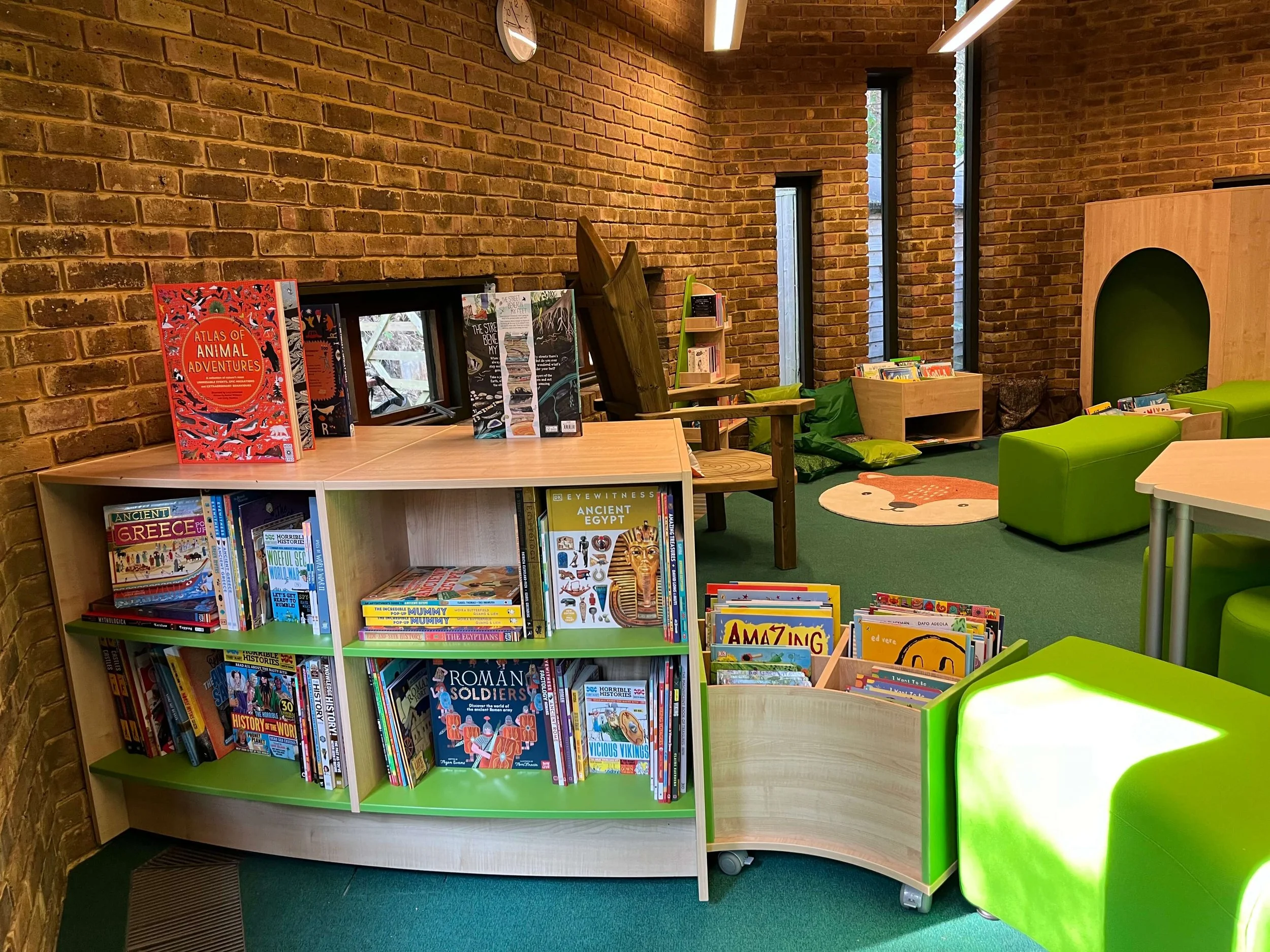 Non fiction books organised by topics at a primary school library stocked by Chestnut Books.