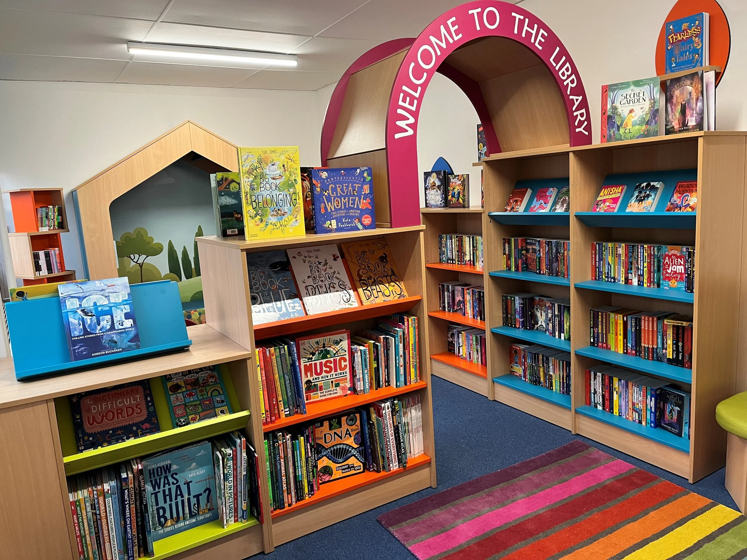 Key Stage Two Reading Area filled with modern and challenging fiction and non fiction to inspire a love for reading.