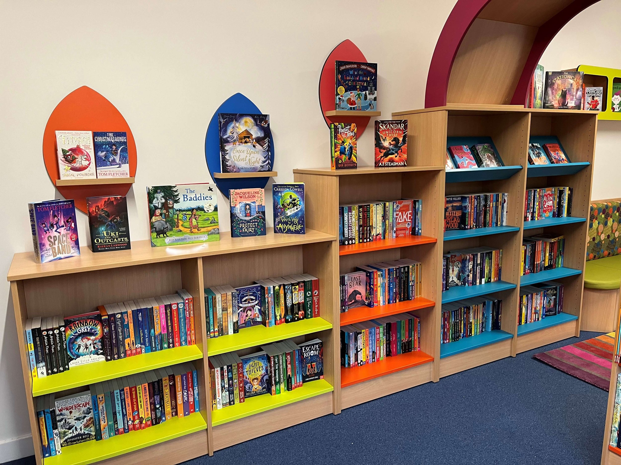 Modern and diverse chapter books on display in primary school library. Books chosen to challenge high ability children by Chestnut Books.