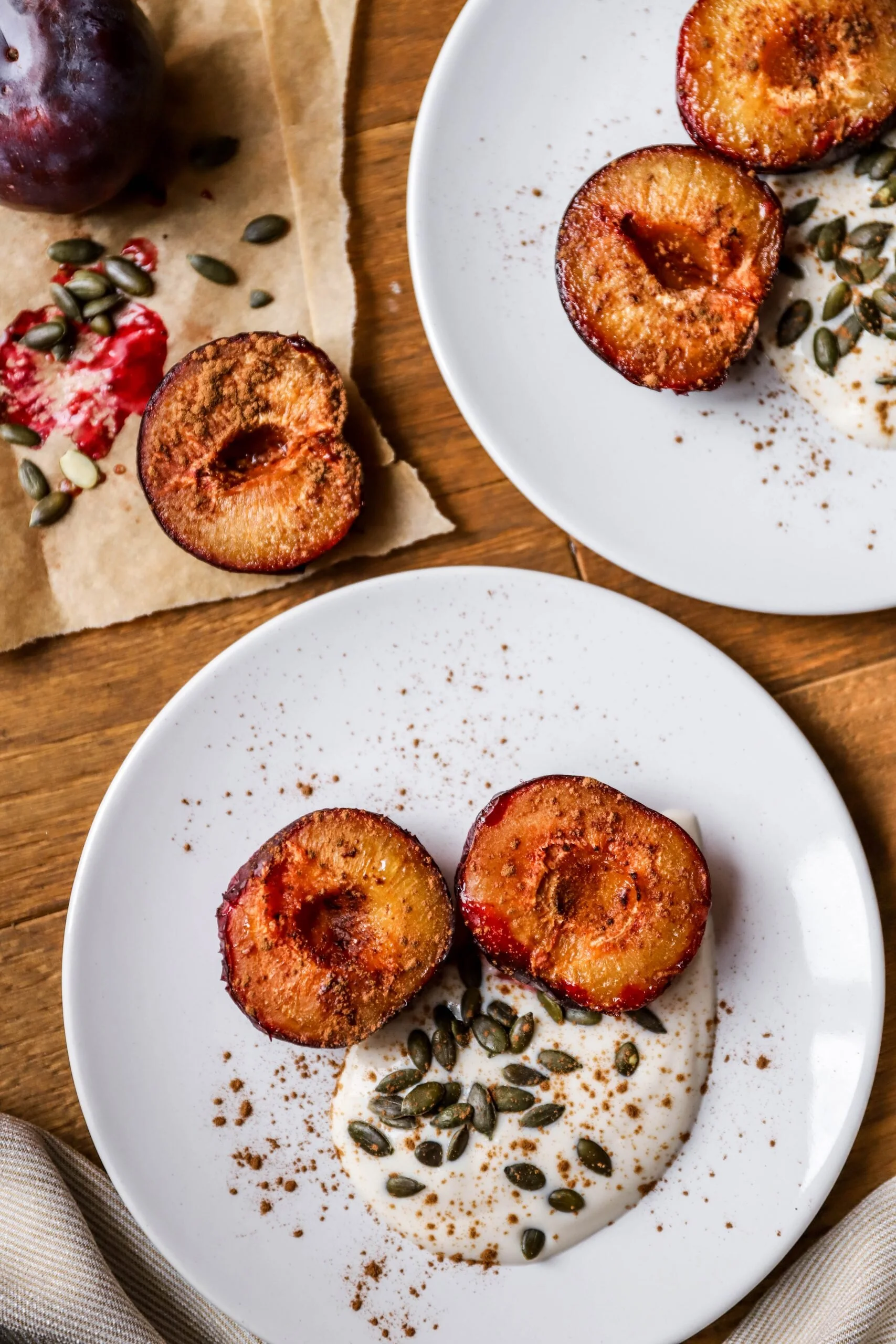 MAPLE ROASTED PLUMS WITH COCONUT YOGHURT &amp; PUMPKIN SEEDS 