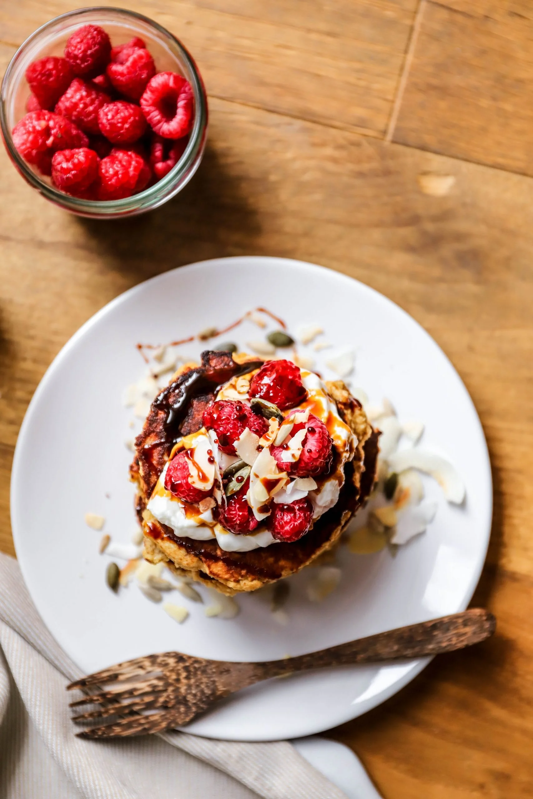 COCONUT PANCAKES WITH RASPBERRIES &amp; COCONUT SYRUP 
