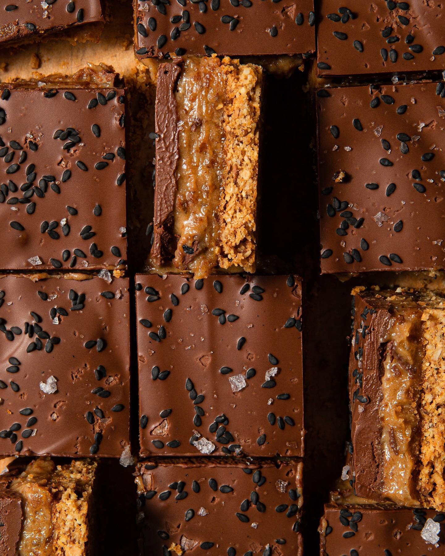 TAHINI CARAMEL BARS &thinsp;
&thinsp;
Gimme that fudge! Tahini is a main actor when it comes to hummus, but let&rsquo;s give it more stage time in the sweet section. Blended  with sweet dates, paired with a nutty crust and a smooth chocolate coat, al