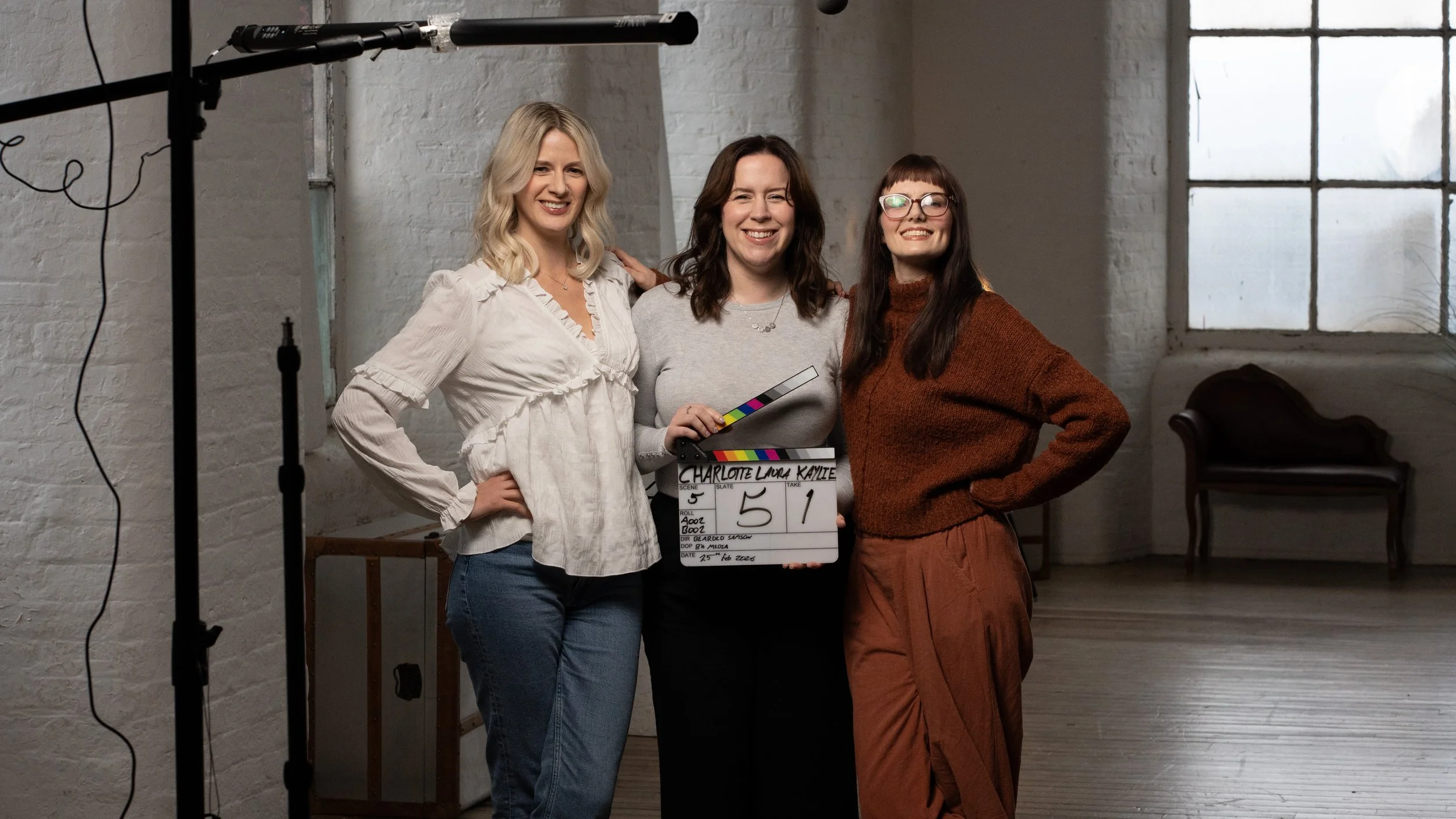 Charlotte, Kaylie and Laura from Sector 3 stand smiling at the camera
