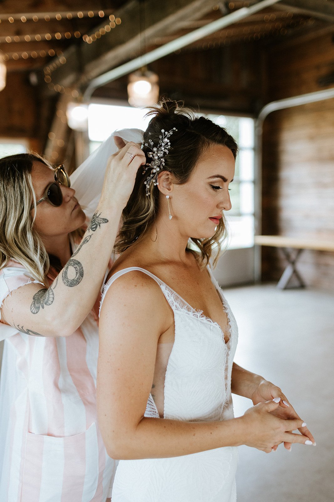 brides dancing in a field
