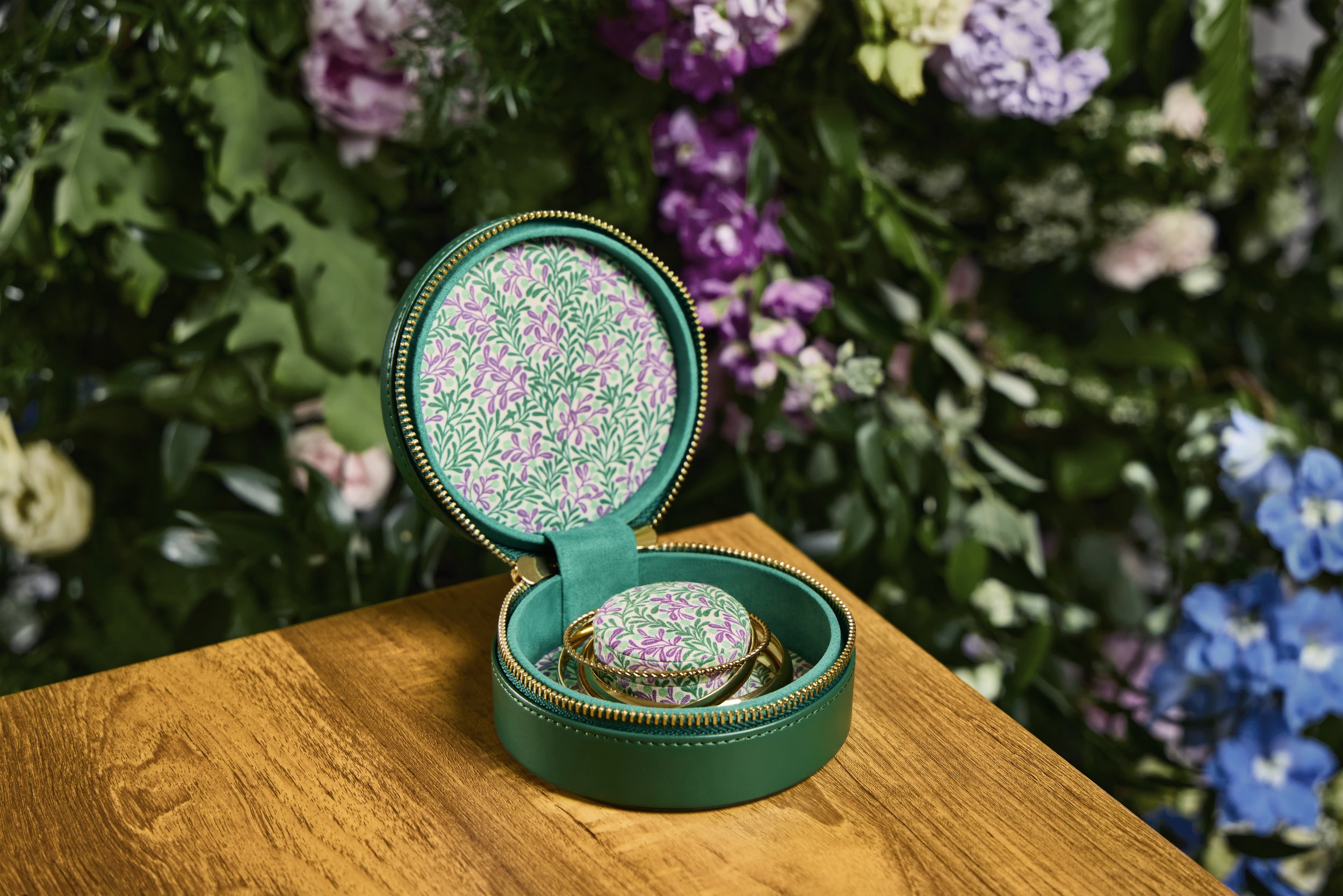  WOLF x Fiona Howard Sophia round zip case in Forest Green. 