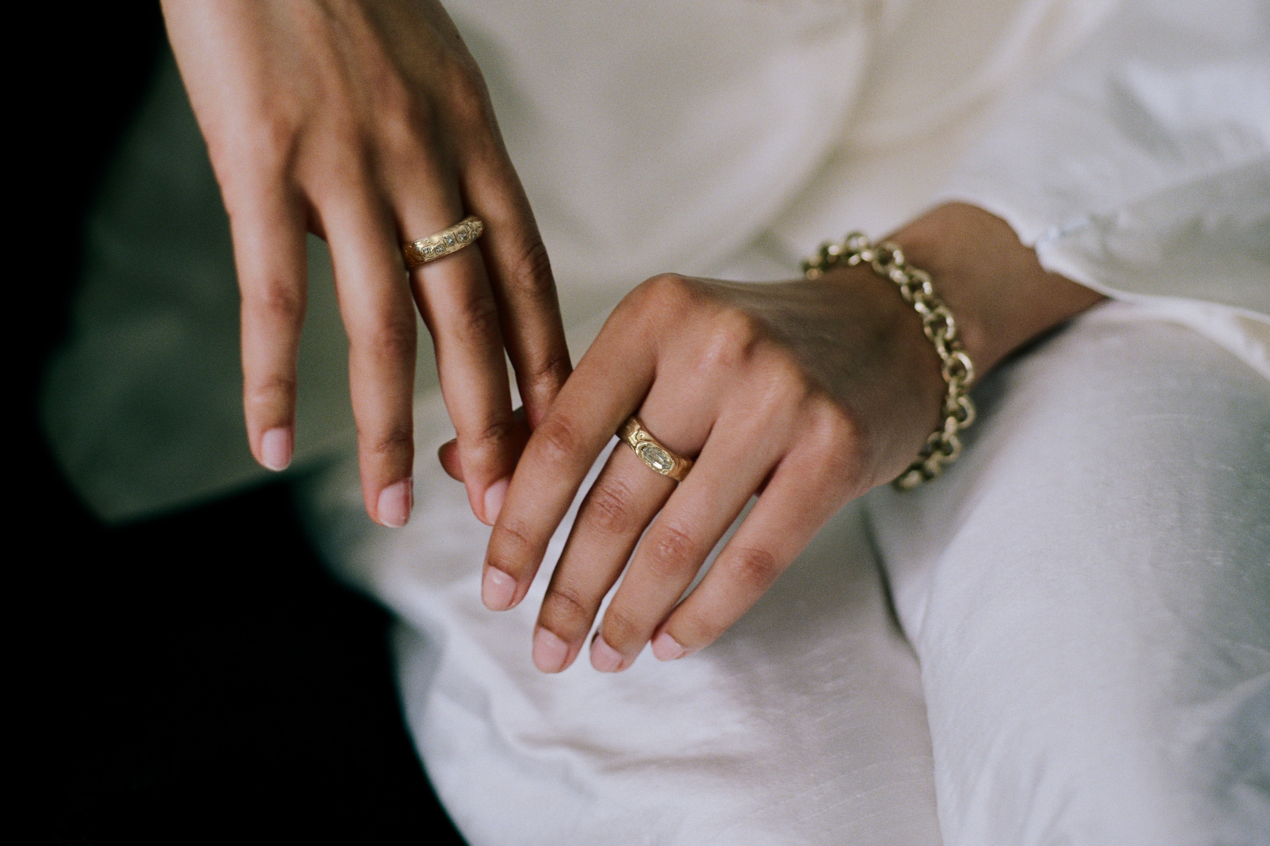 Diamond rings and a gold link bracelet from Seun by Ellis Mhairi Cameron.