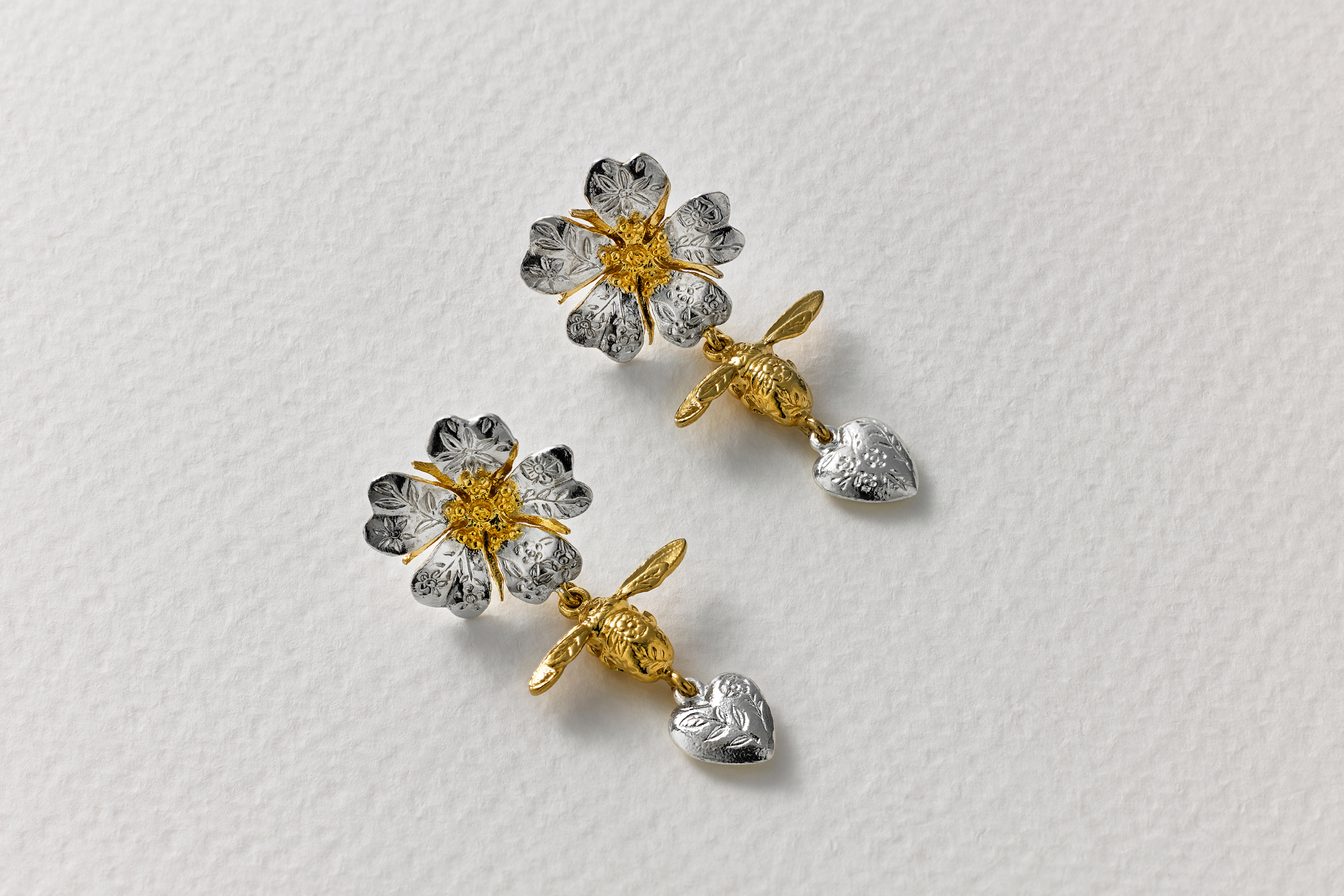 Alex Monroe Floral Engraved Wild Rose, Bee & Heart drop earrings.