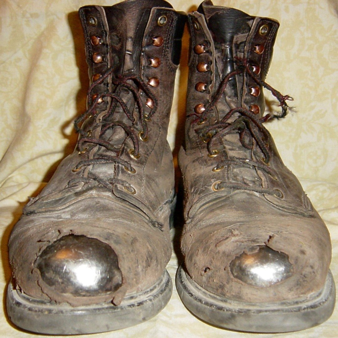 Commitment, Service, Sacrifice. 
Wear and tear on EMT's boots show this work isn't a desk job.