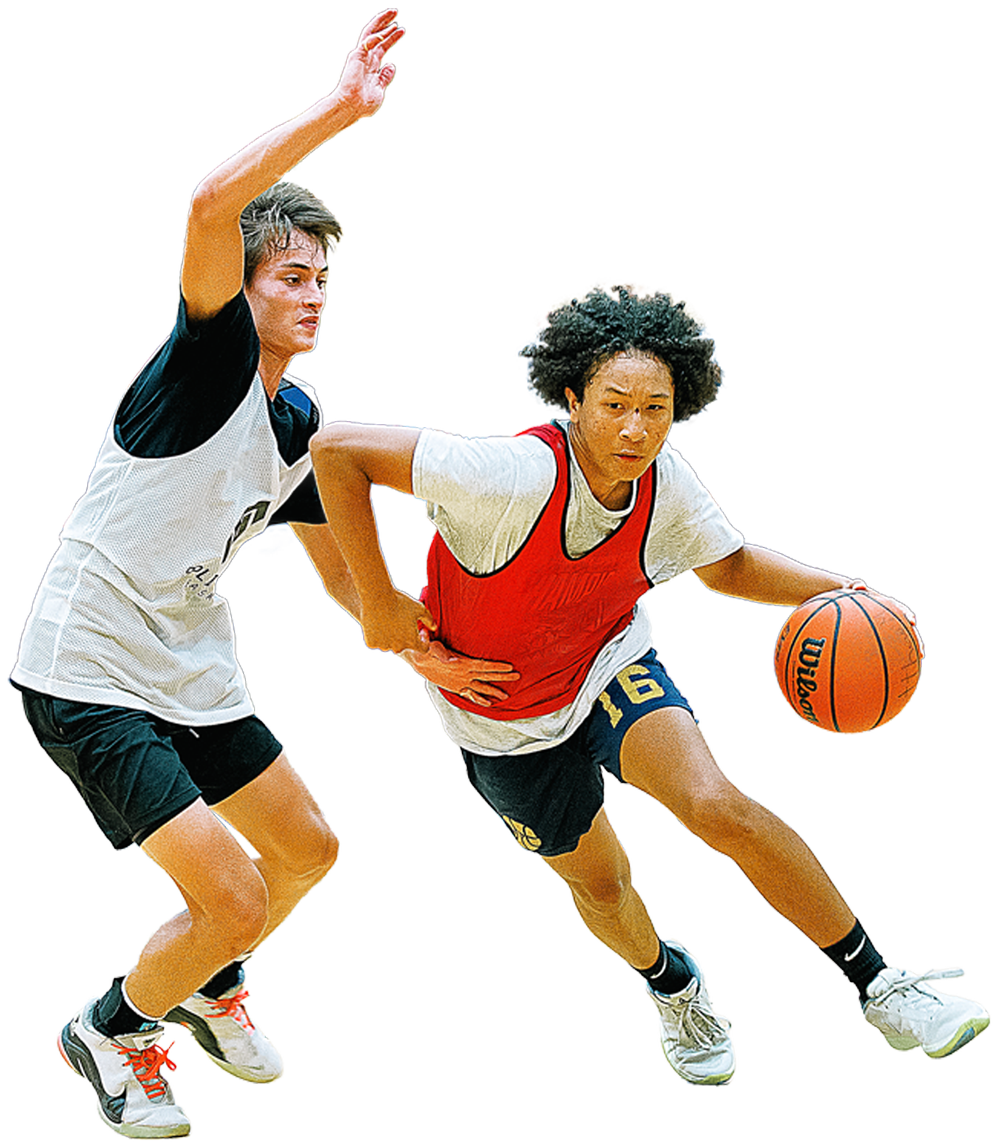 Two Split Second players, one driving to the basket while the other defends
