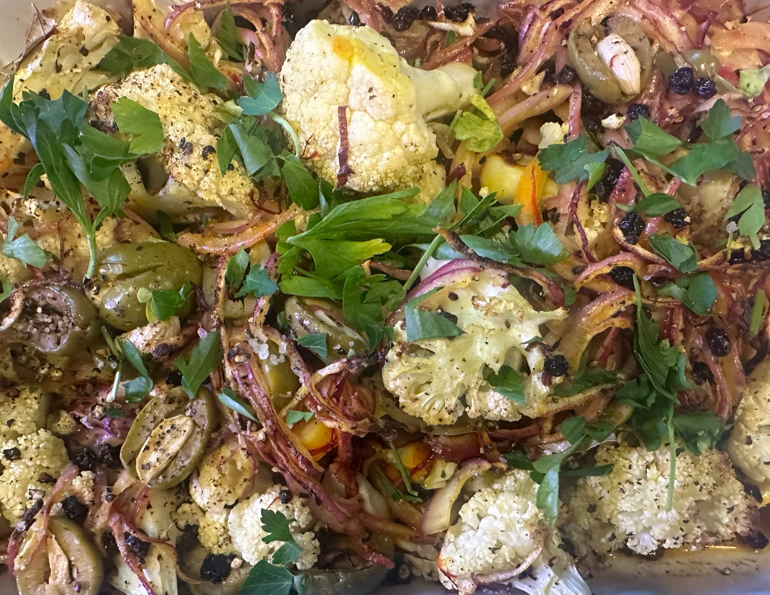 Saffron-Roasted Cauliflower with Garlic-Stuffed Olives and Currants