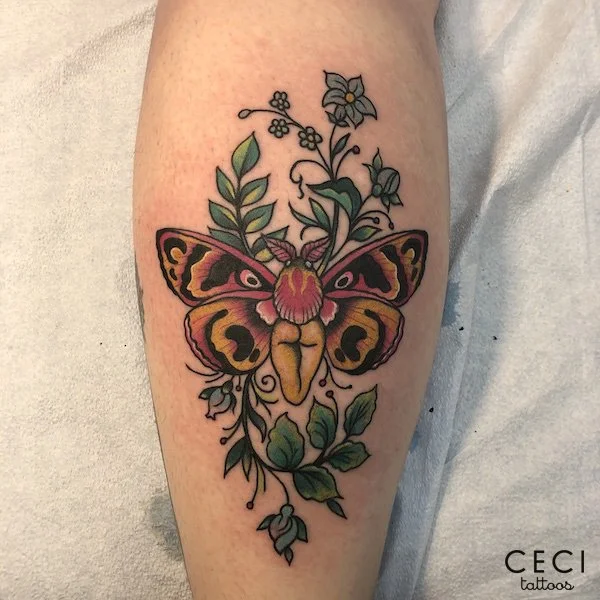 Moth booty tattoo