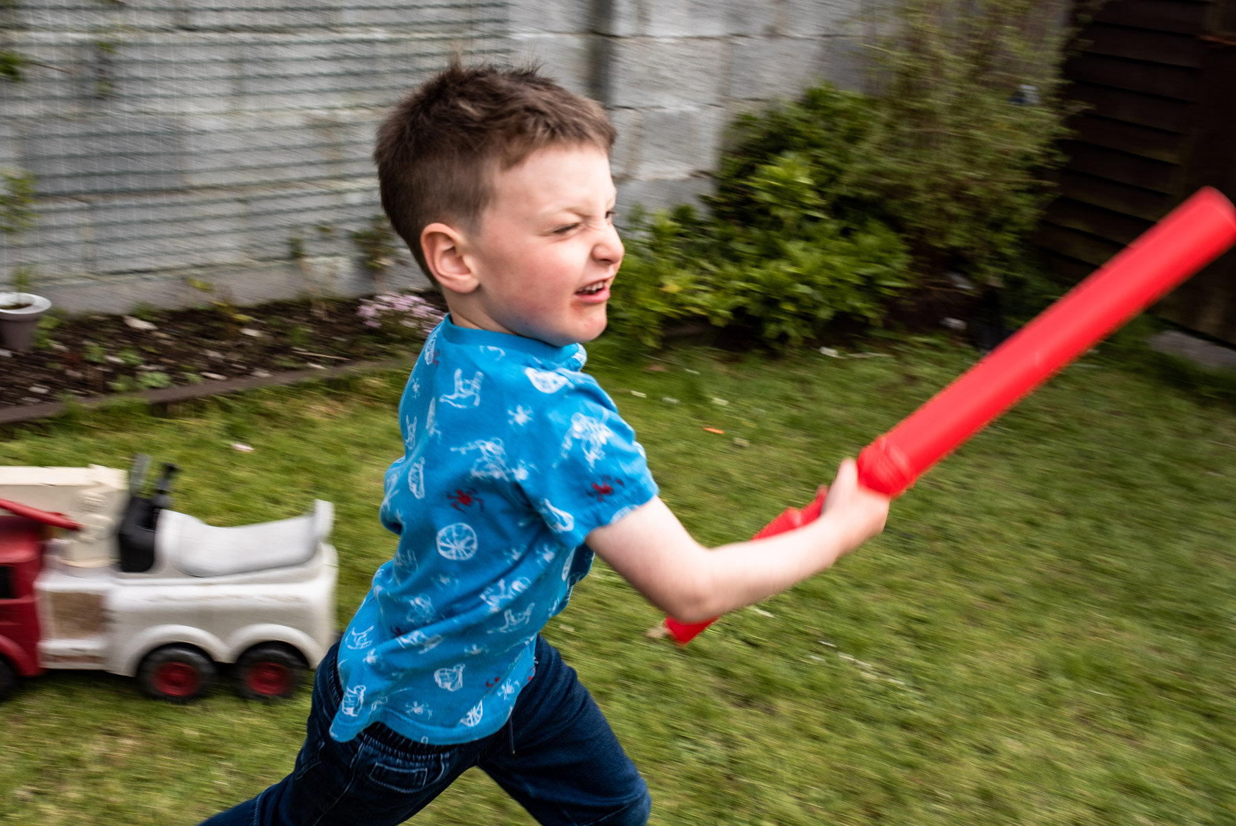 boy running with light saber