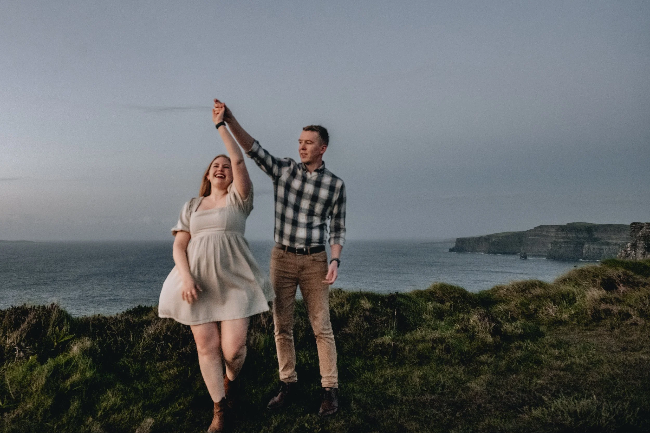 Couples session cliffs of moher at sunset with couple dancing 