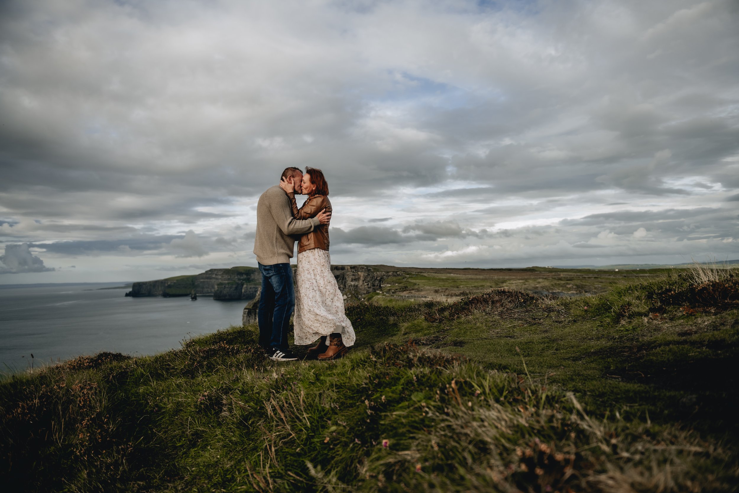 Vow Renewal Cliffs of Moher Couple Kissing on the Edge