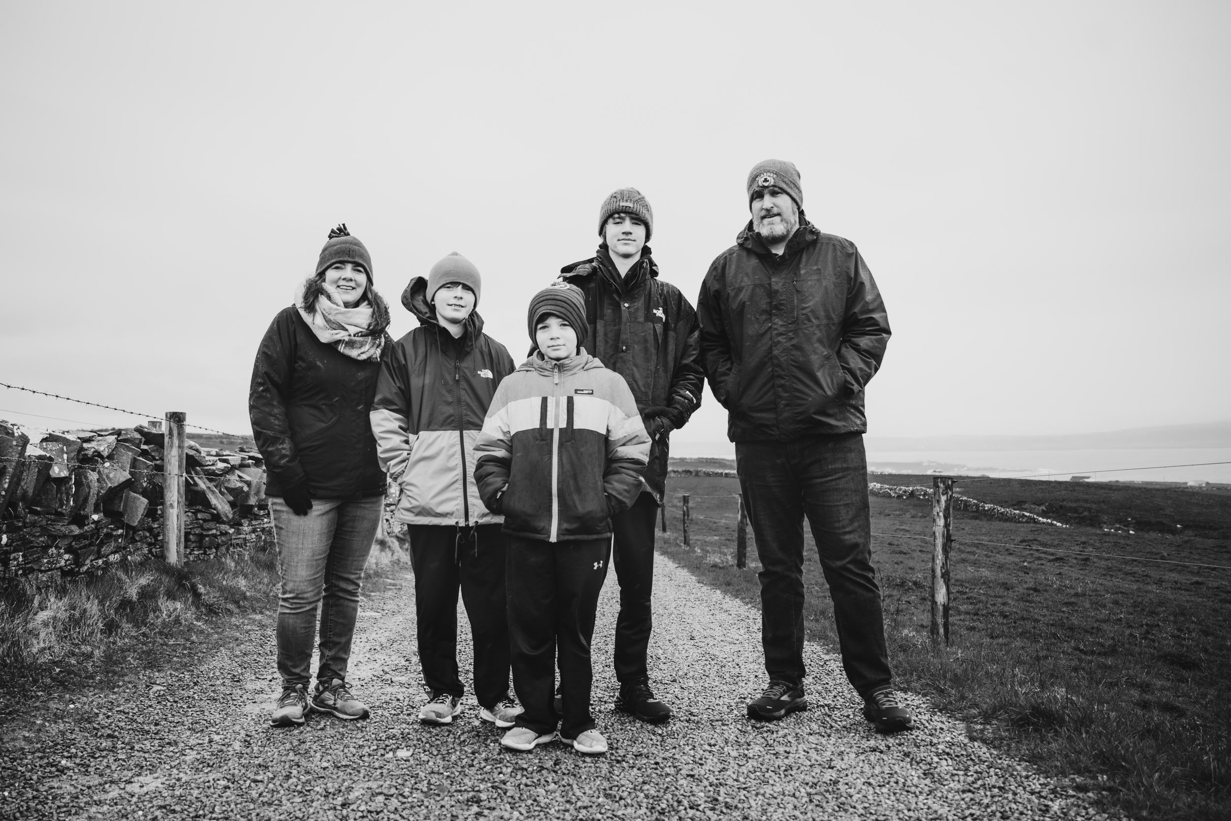 Black and white family portrait on irish road in co clare