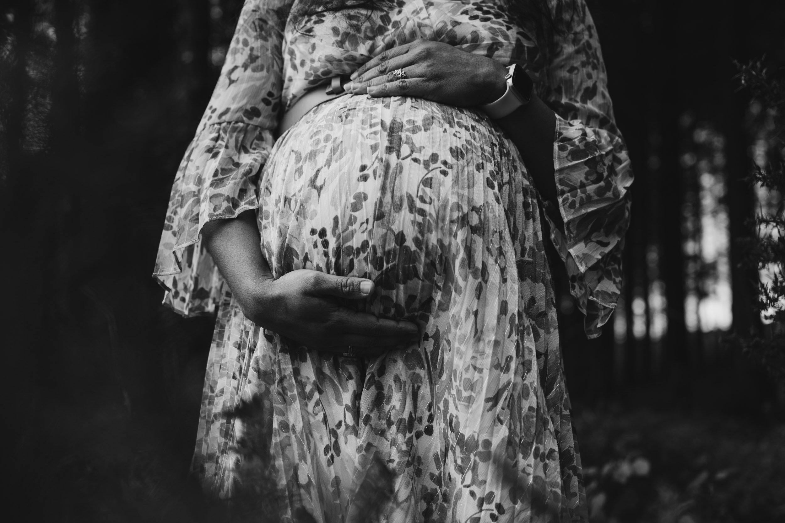 black and white pregnant belly rainy maternity shoot cratloe woods ireland maternity photographer ireland