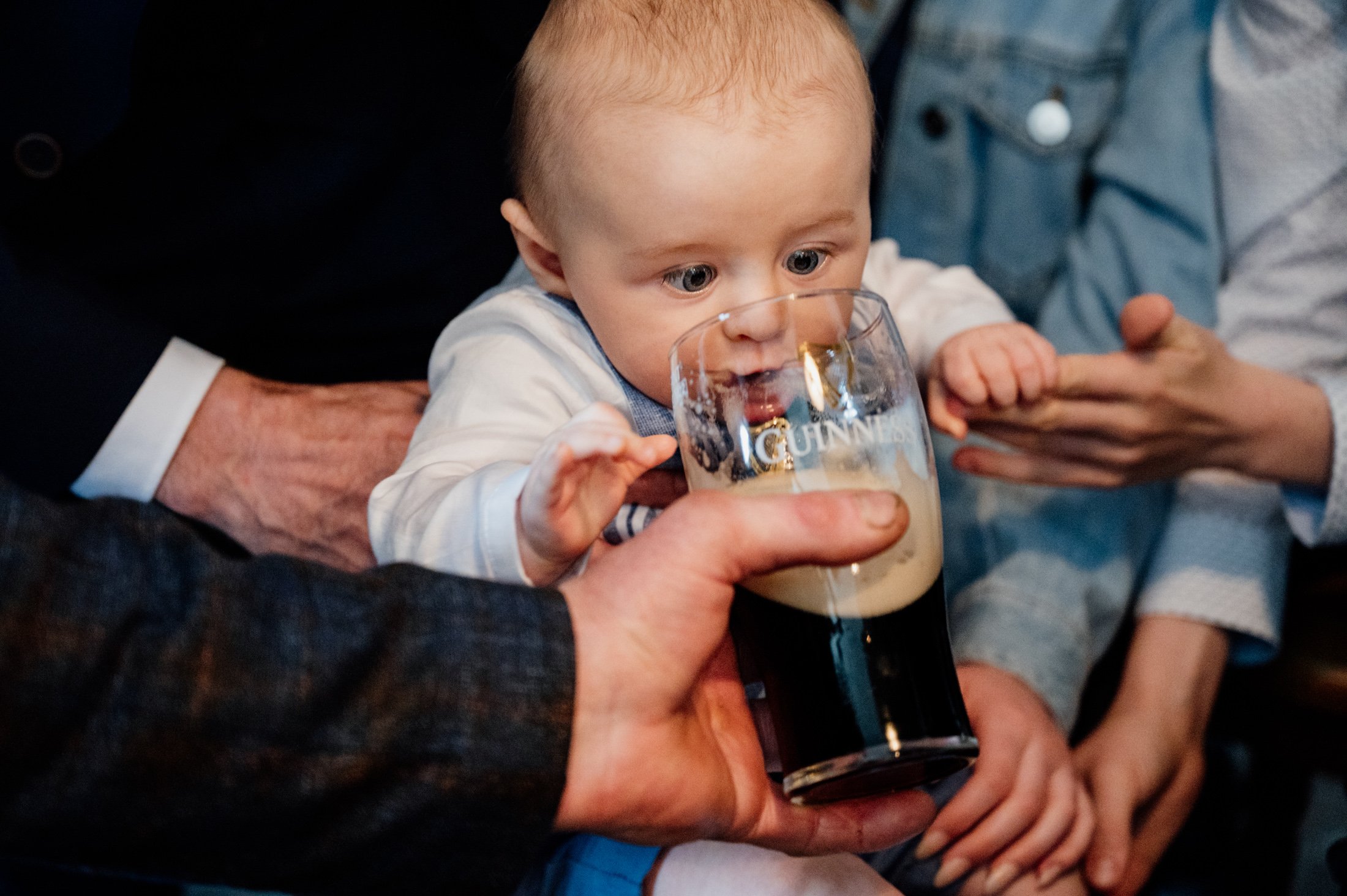 baby with guinness glass christening photos limerick photographer