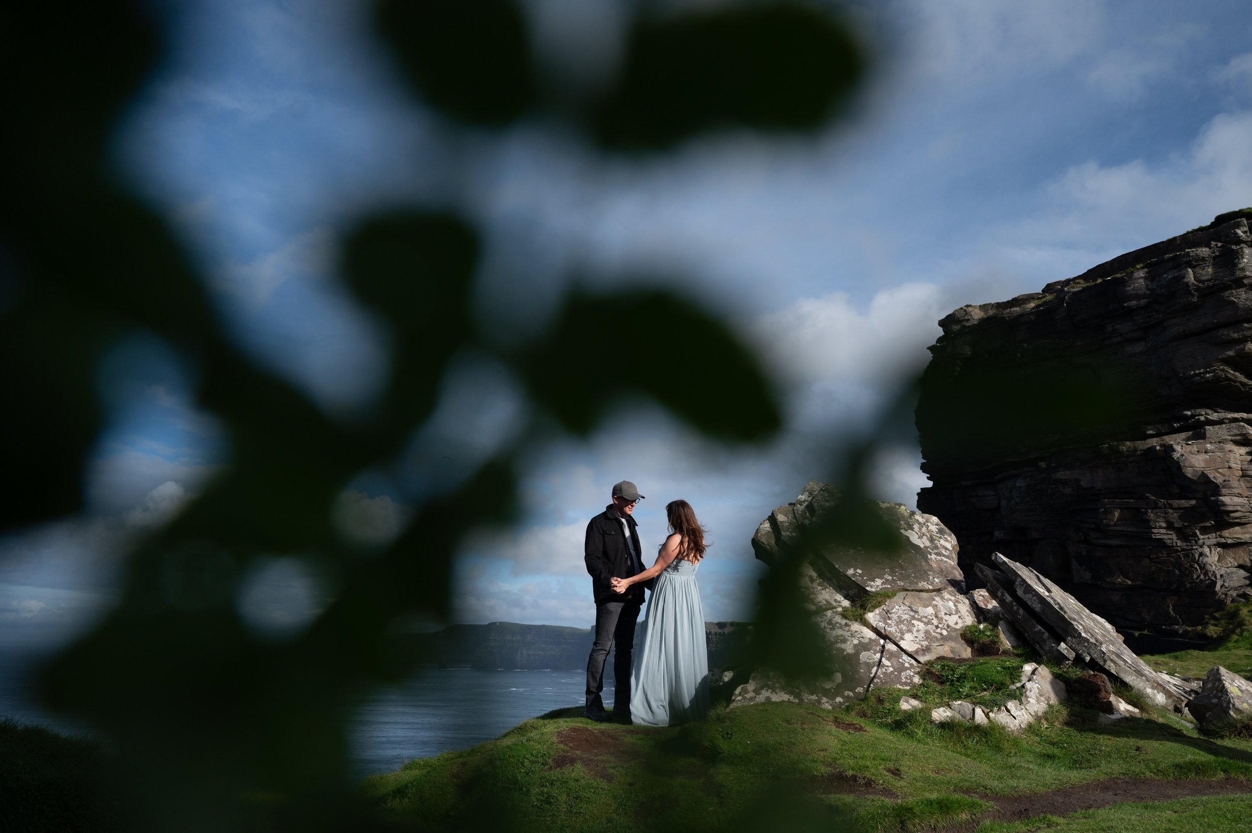 Marie O'Mahony photographer Cliffs of Moher anniversary couples photo session through leaves